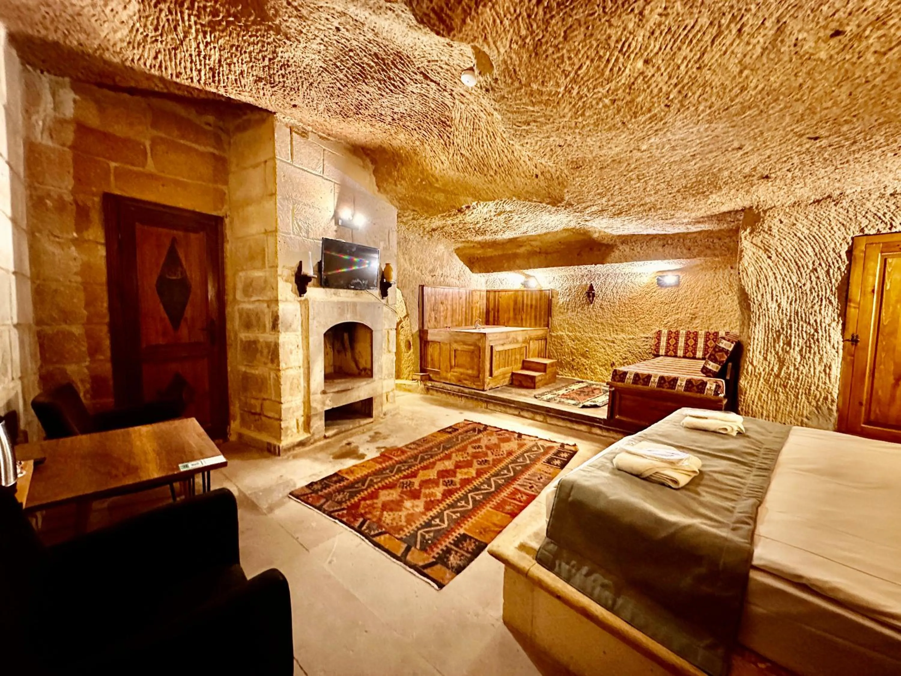 Bed in Harkasos Cave Hotel