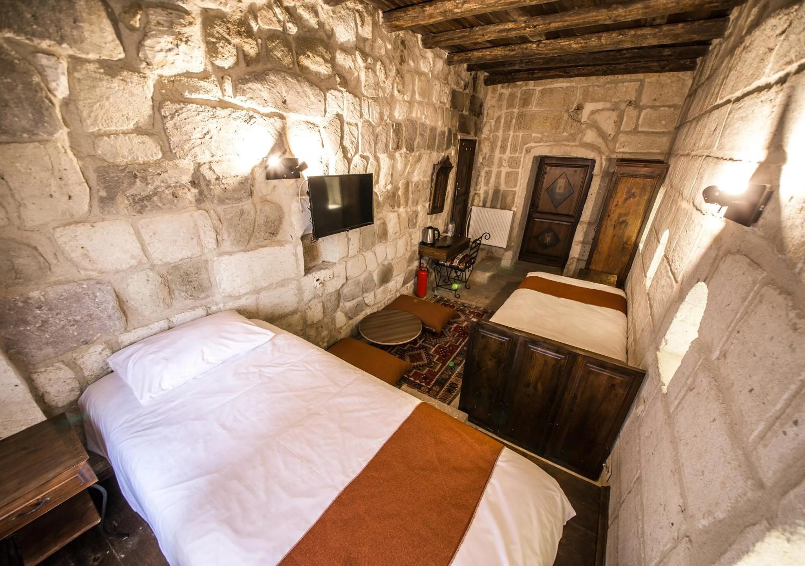 Bed in Harkasos Cave Hotel