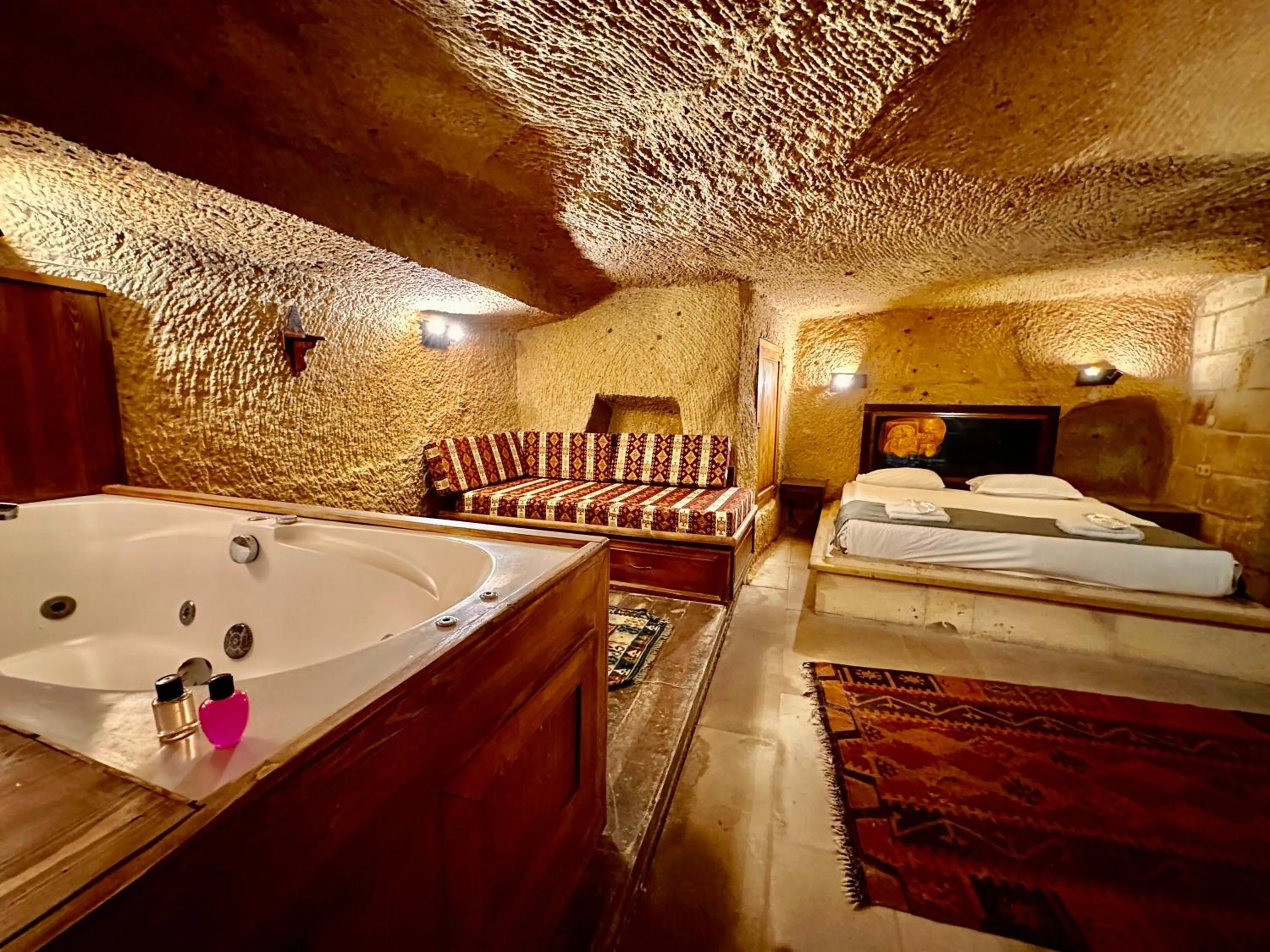 Bed in Harkasos Cave Hotel