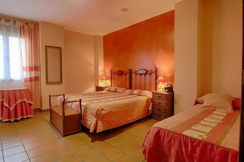 Bed in Hotel Rural Hojaranzos