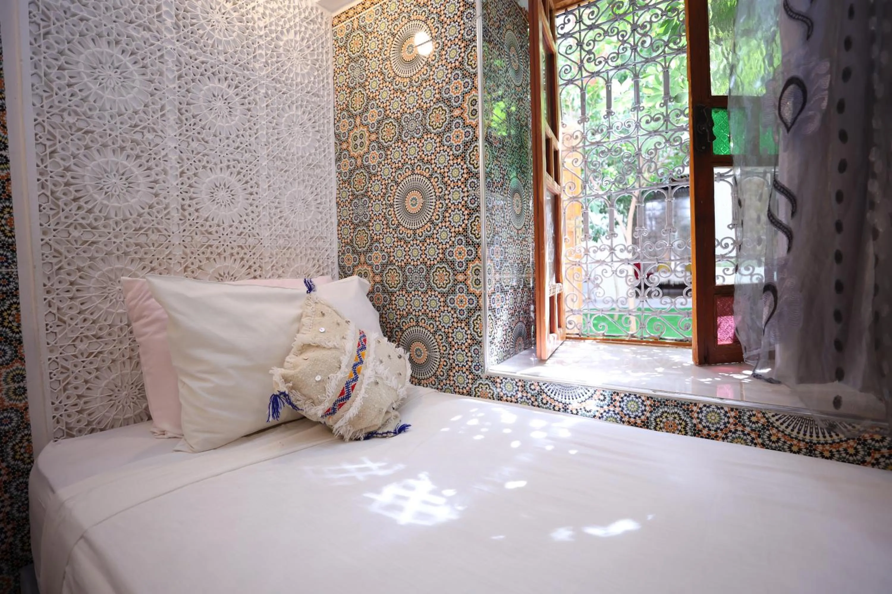 Bed in Riad O LY