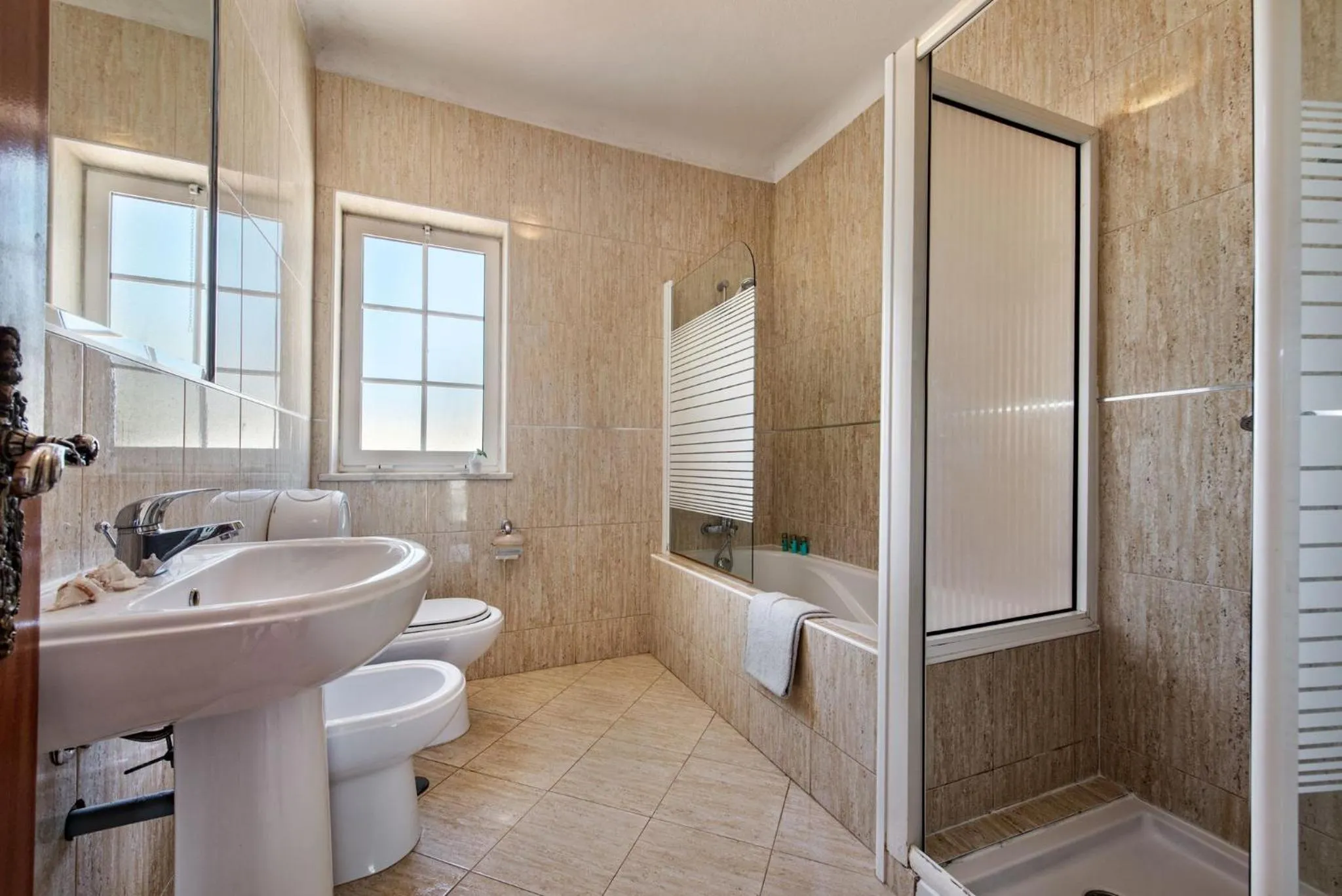 Bathroom in A Fantastic Place for Families, Hilton Hotel are and close to amenities