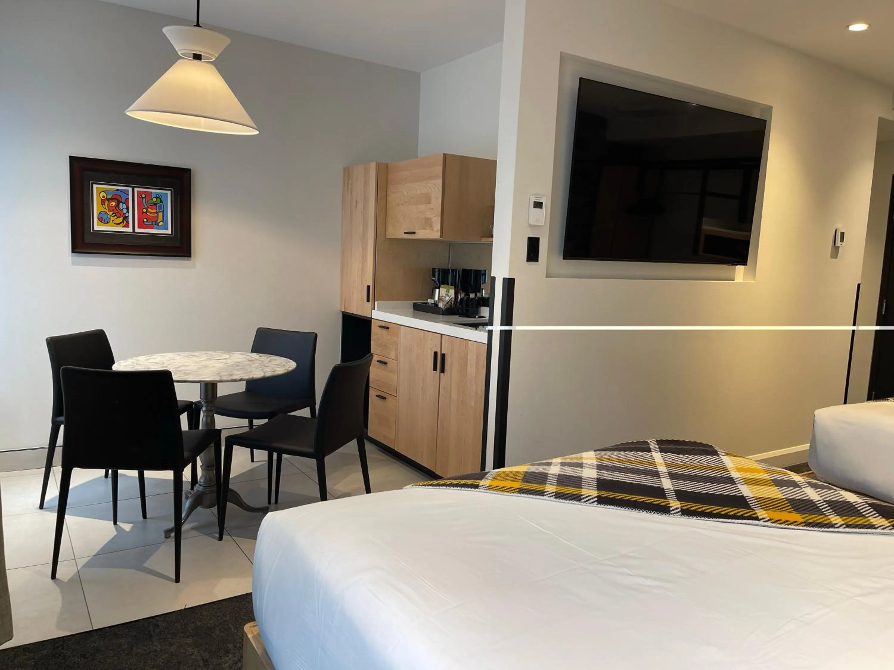 Bed in Hotel du Vieux Quebec