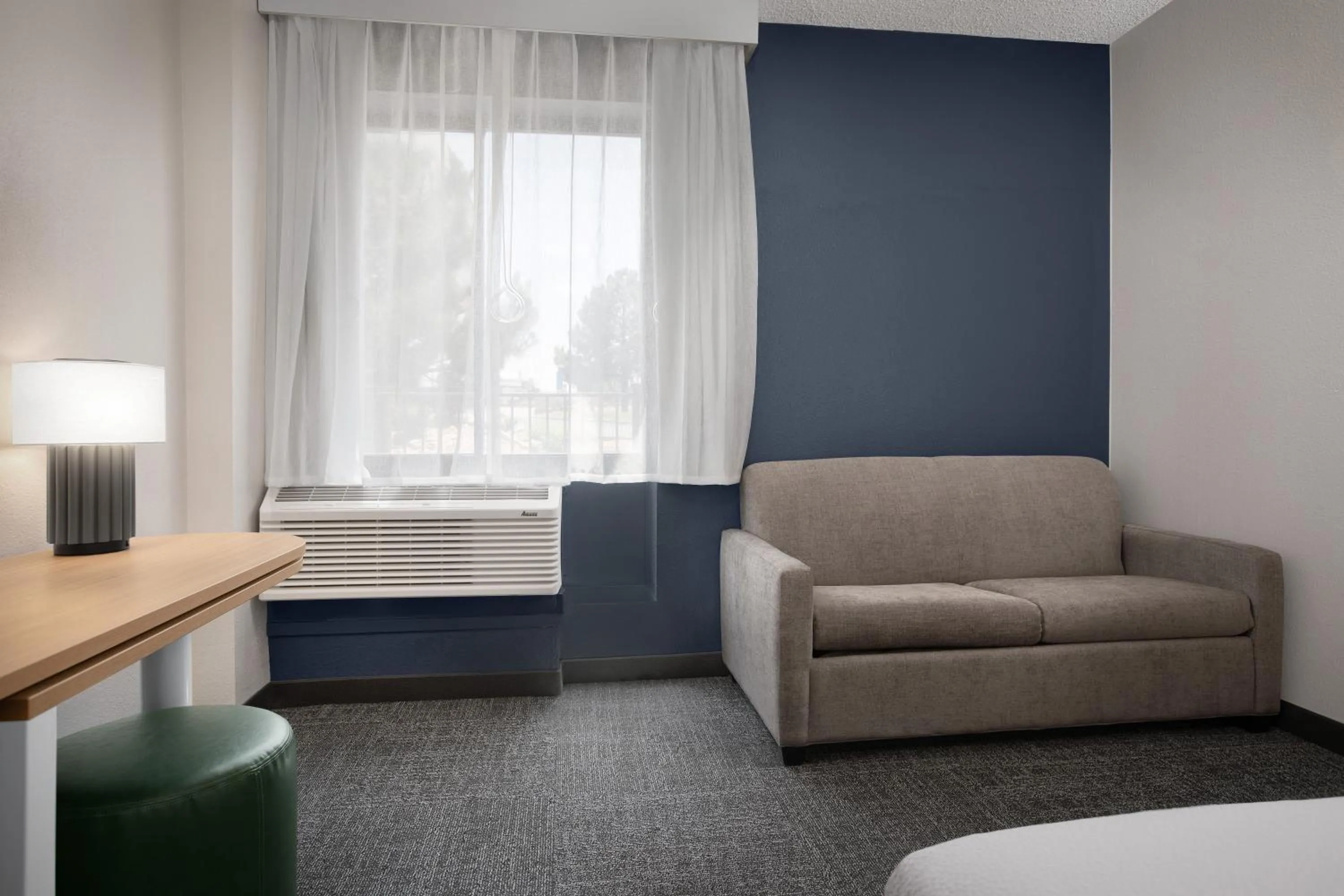 Seating area in Spark by Hilton Denver Tech Center Greenwood Village