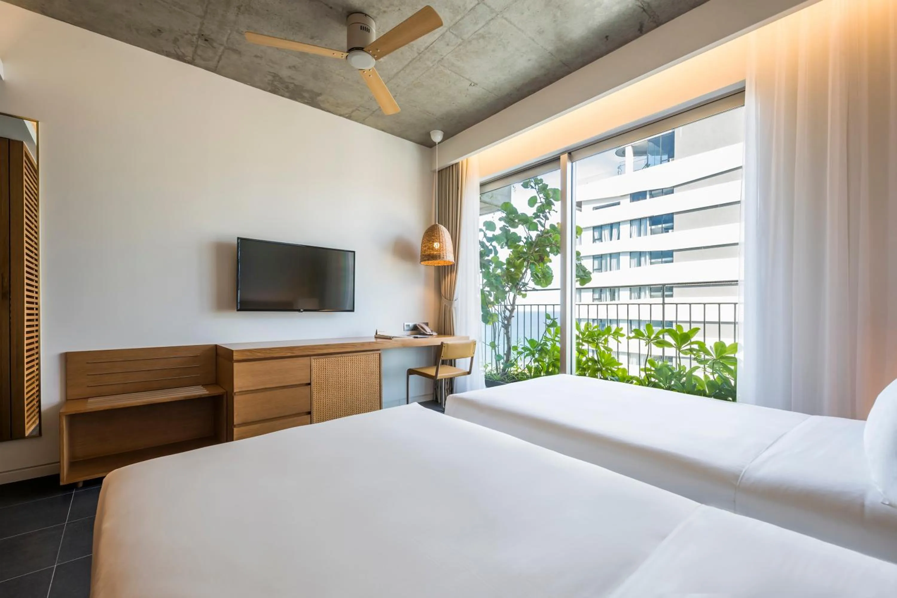 Bed in Chicland Boutique Danang Beach Hotel