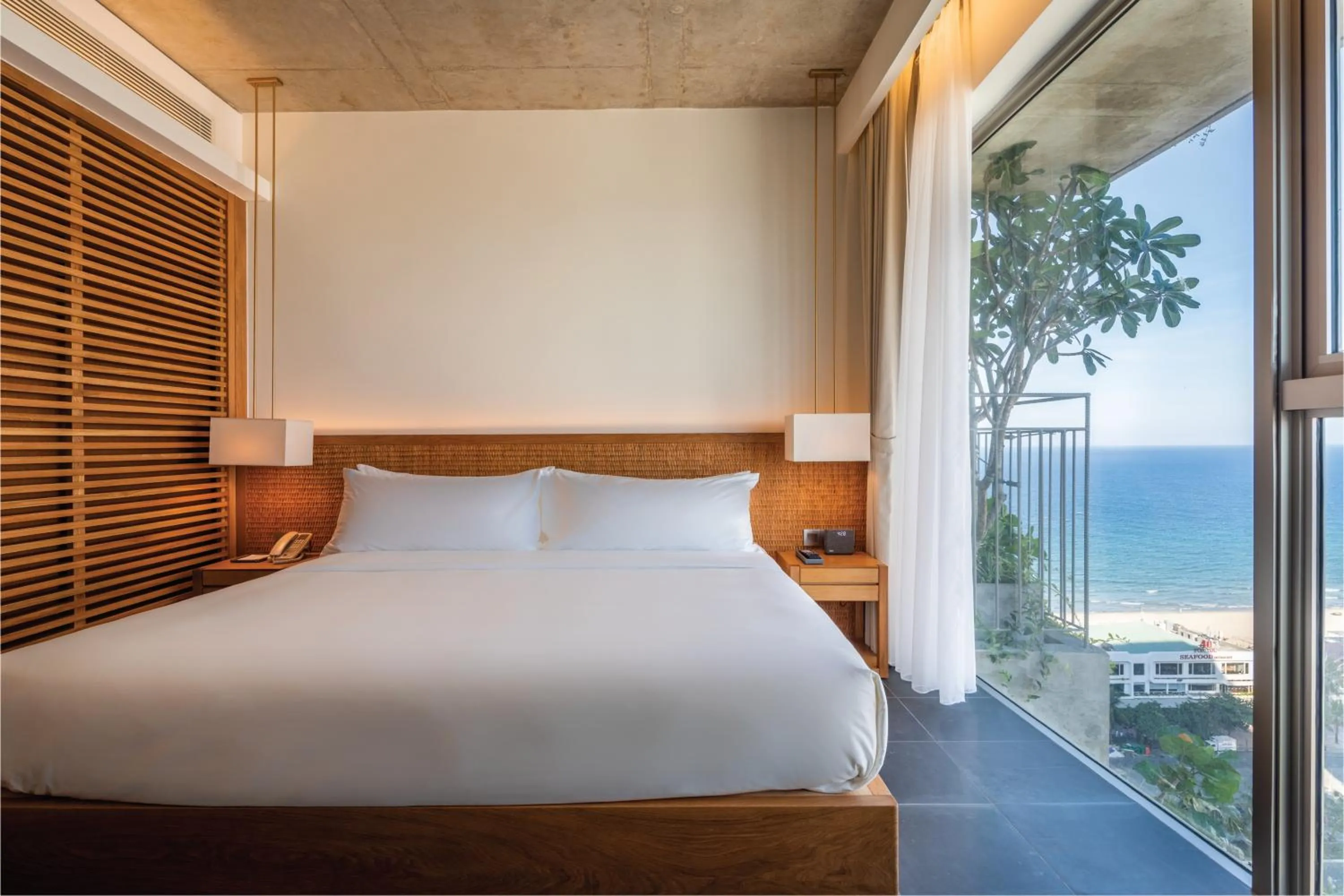 Bed in Chicland Boutique Danang Beach Hotel