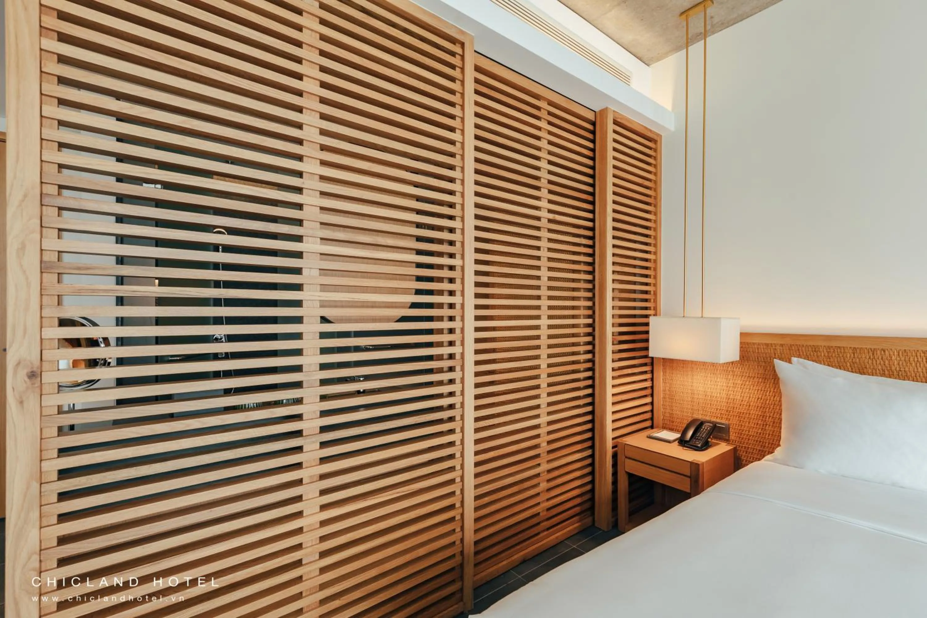 Bed in Chicland Boutique Danang Beach Hotel