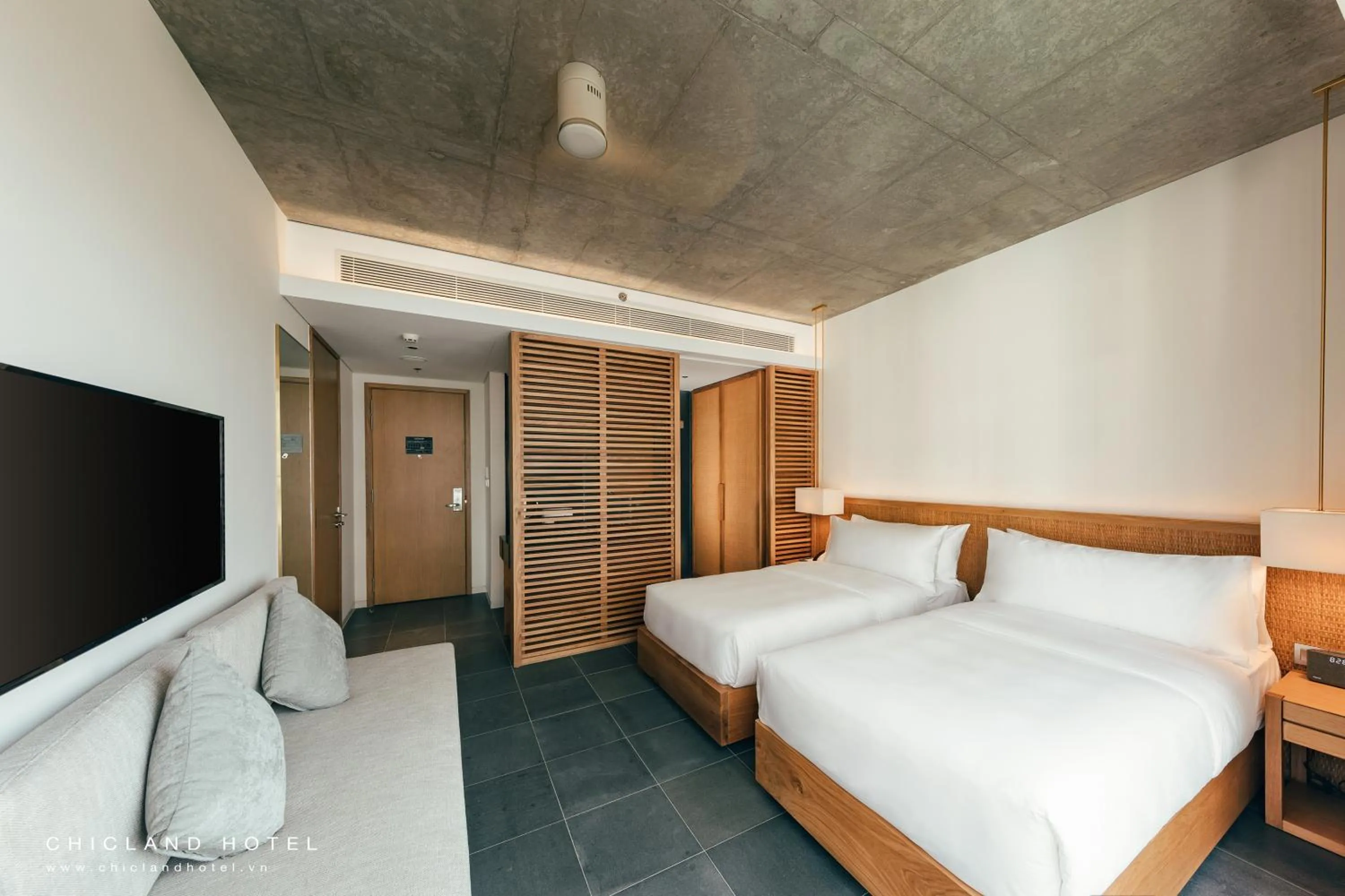 Bed in Chicland Boutique Danang Beach Hotel