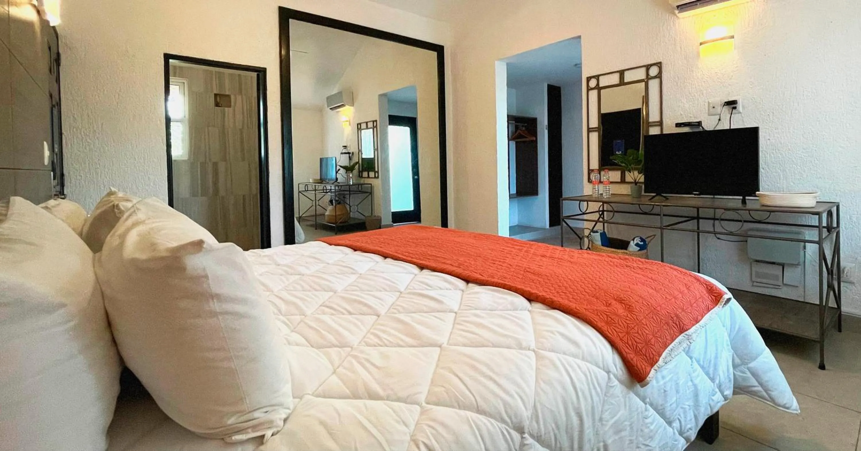 Bed in Tukan Hotel Playa del Carmen