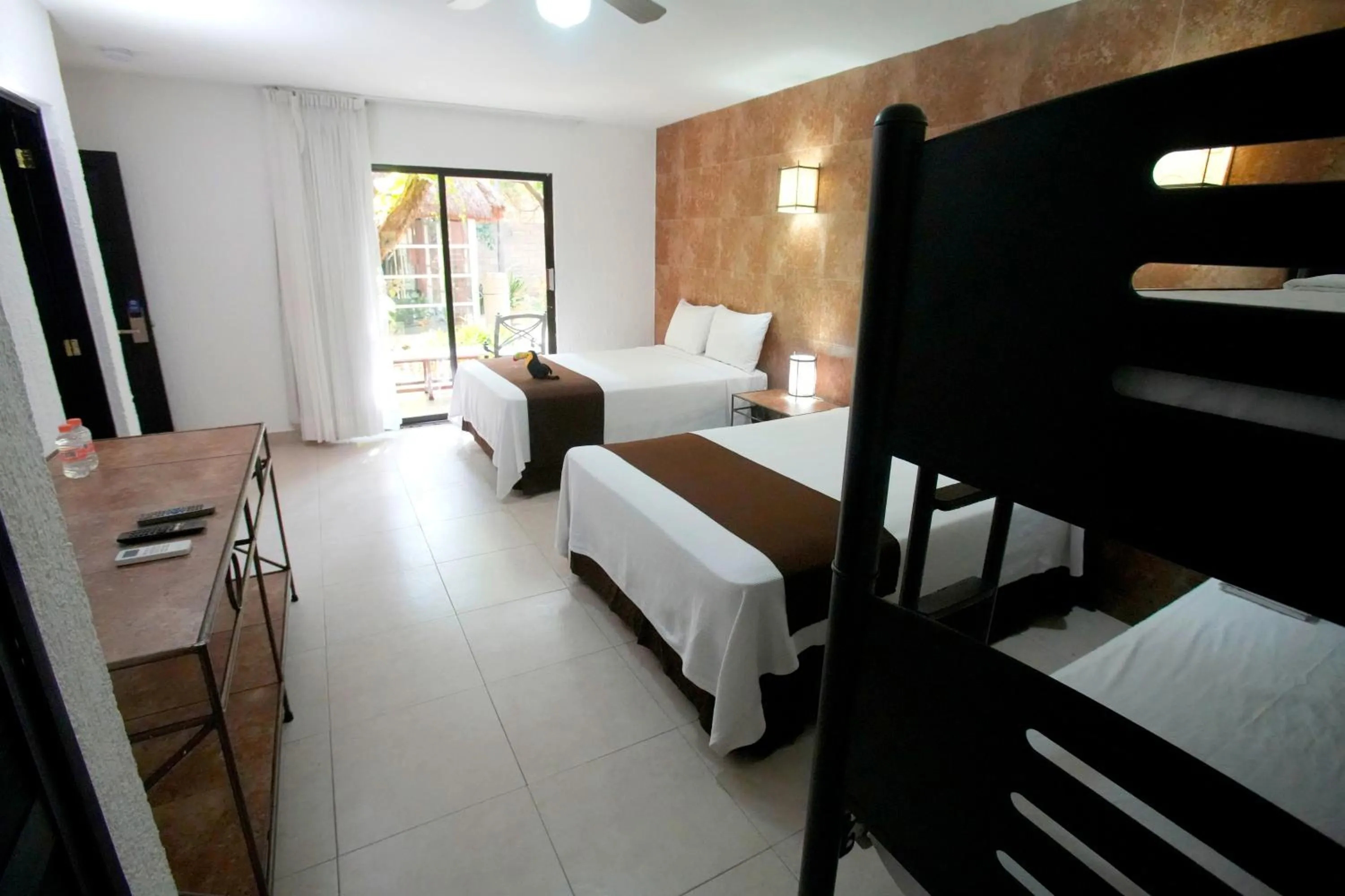 Bed in Tukan Hotel Playa del Carmen