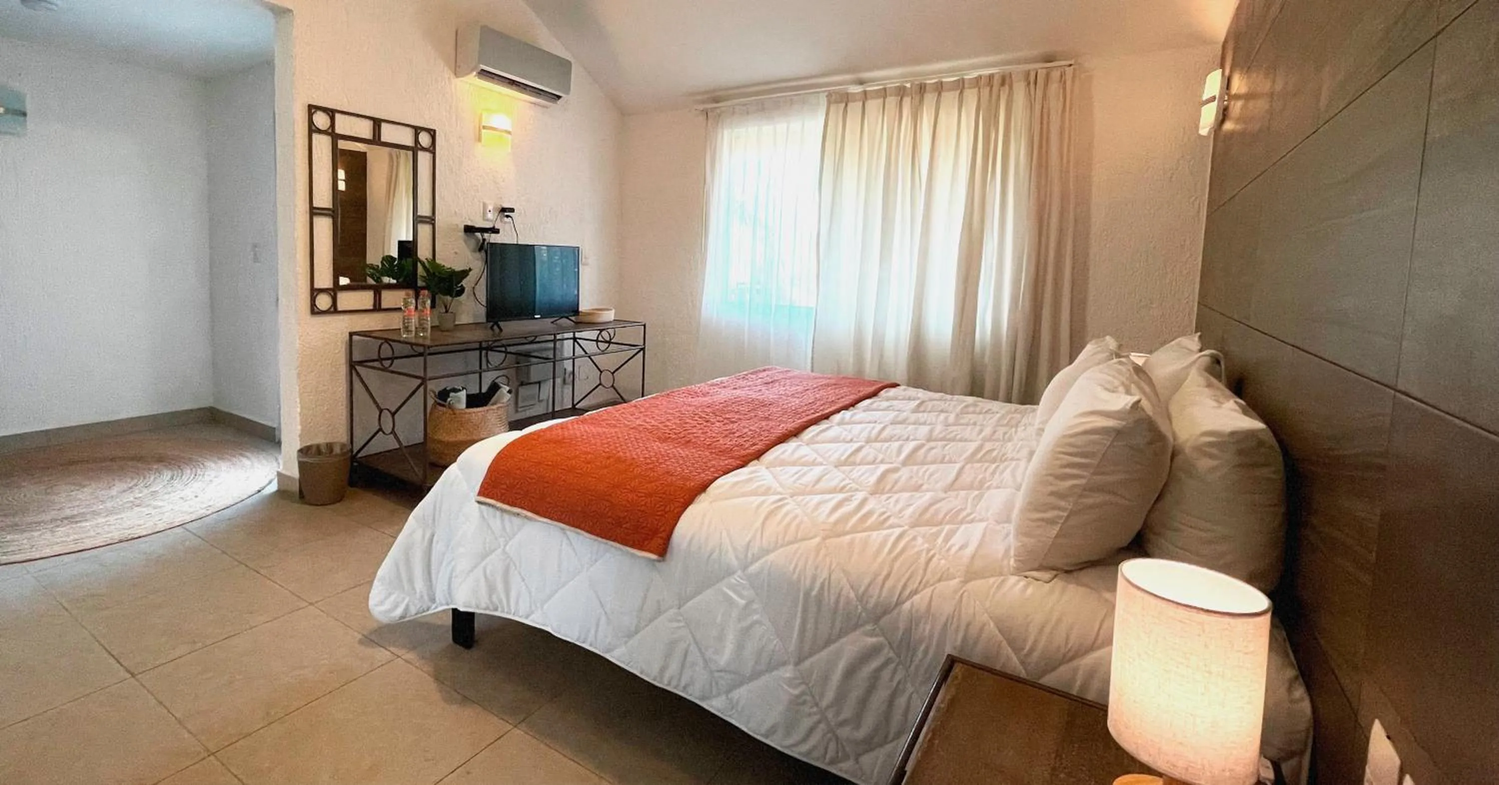 Bed in Tukan Hotel Playa del Carmen