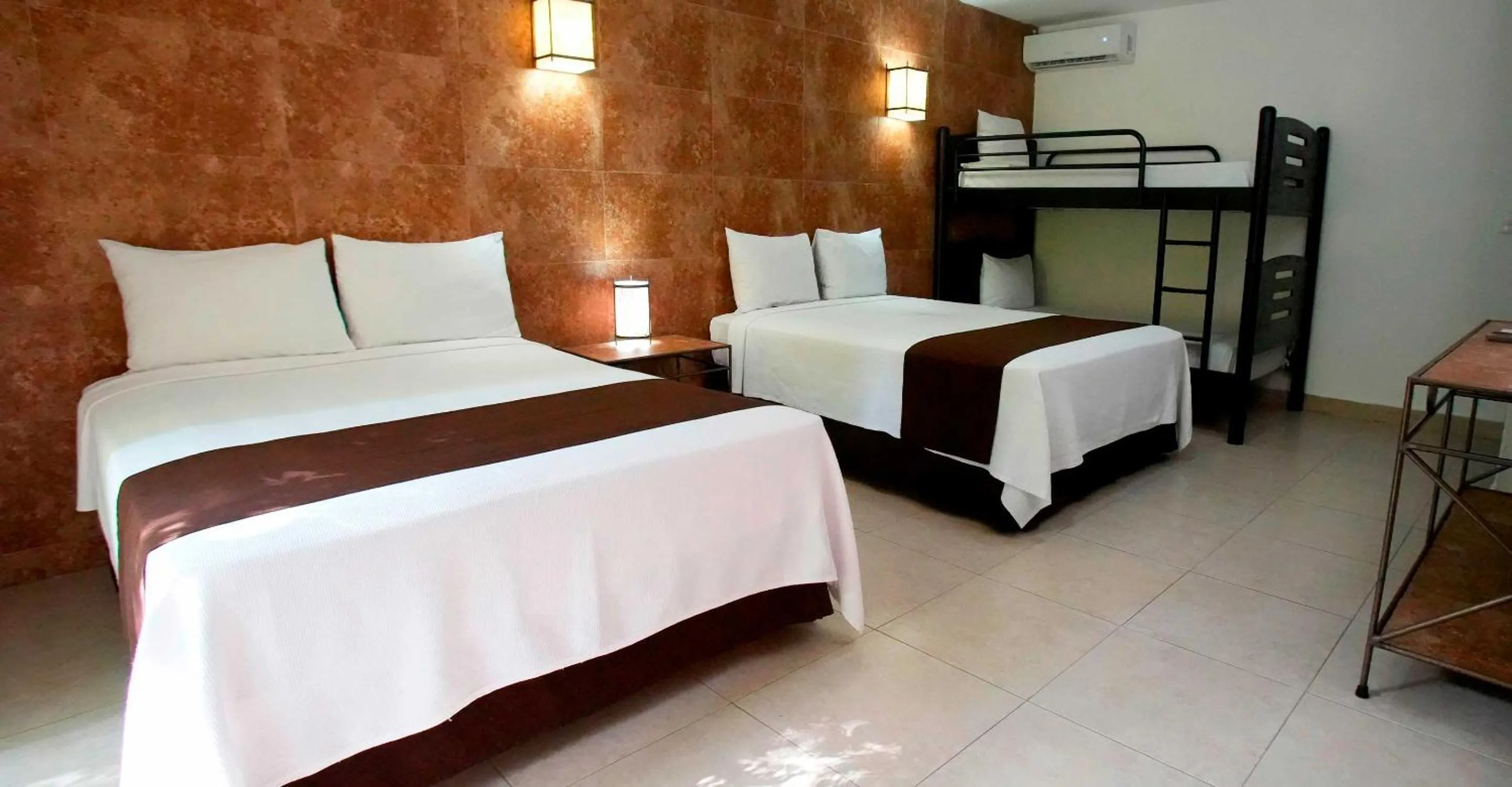 Bed in Tukan Hotel Playa del Carmen