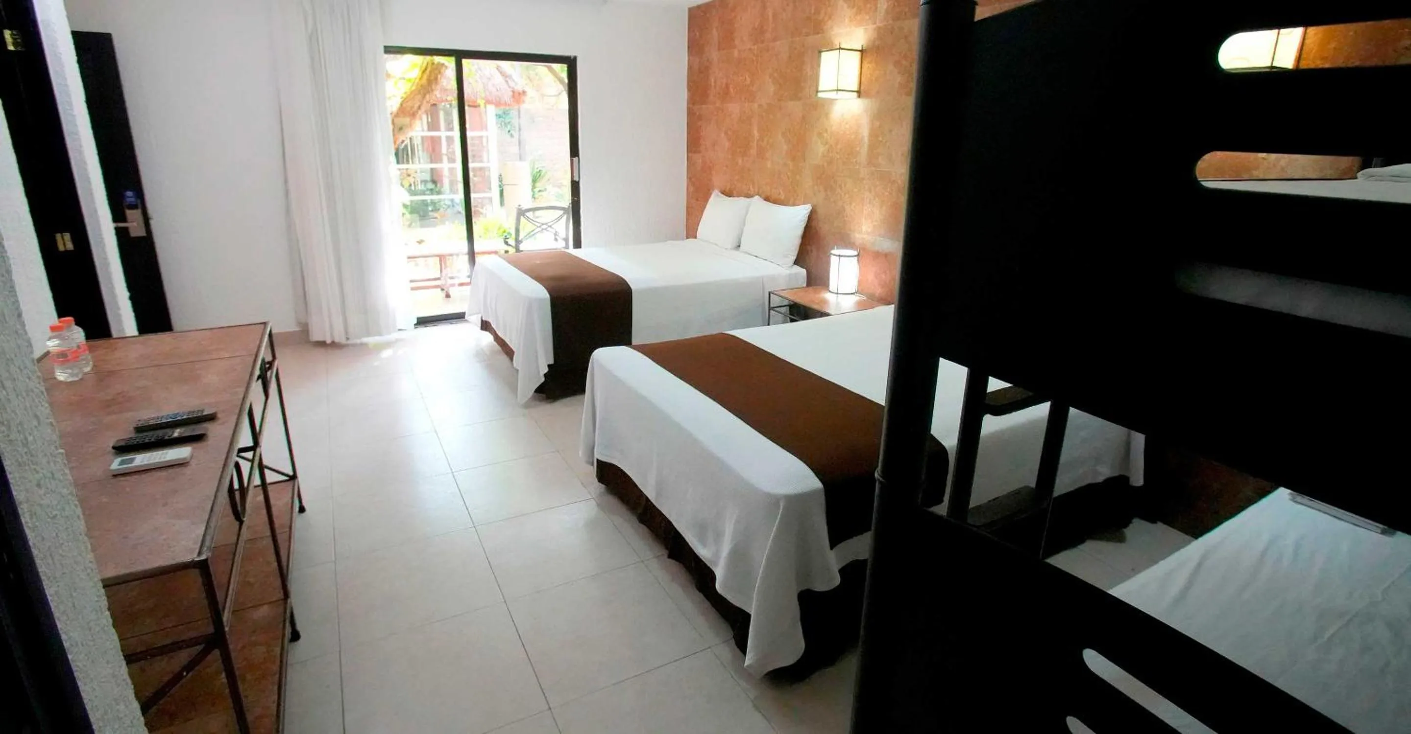 Photo of the whole room, Bed in Tukan Hotel Playa del Carmen