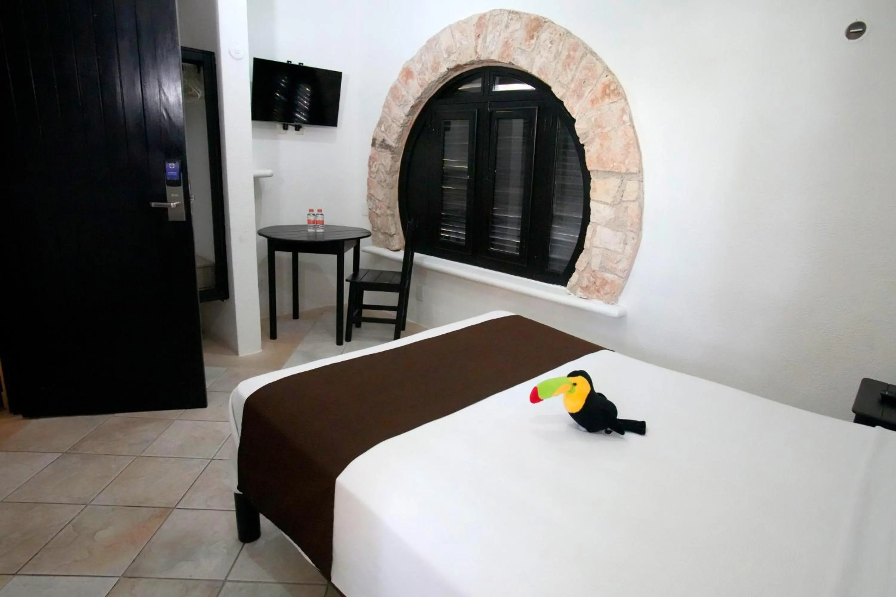 Photo of the whole room, Bed in Tukan Hotel Playa del Carmen
