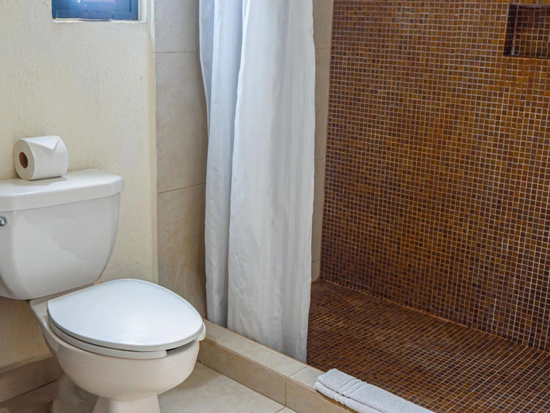 Bathroom in Tukan Hotel Playa del Carmen