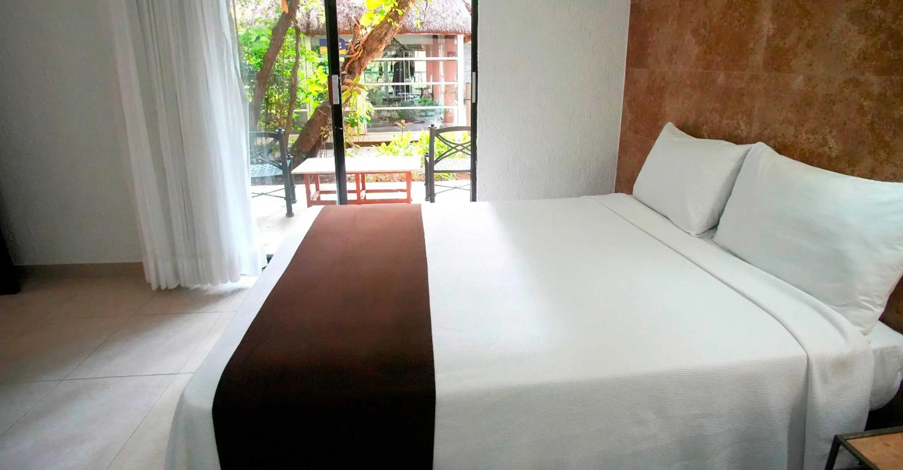 Photo of the whole room, Bed in Tukan Hotel Playa del Carmen