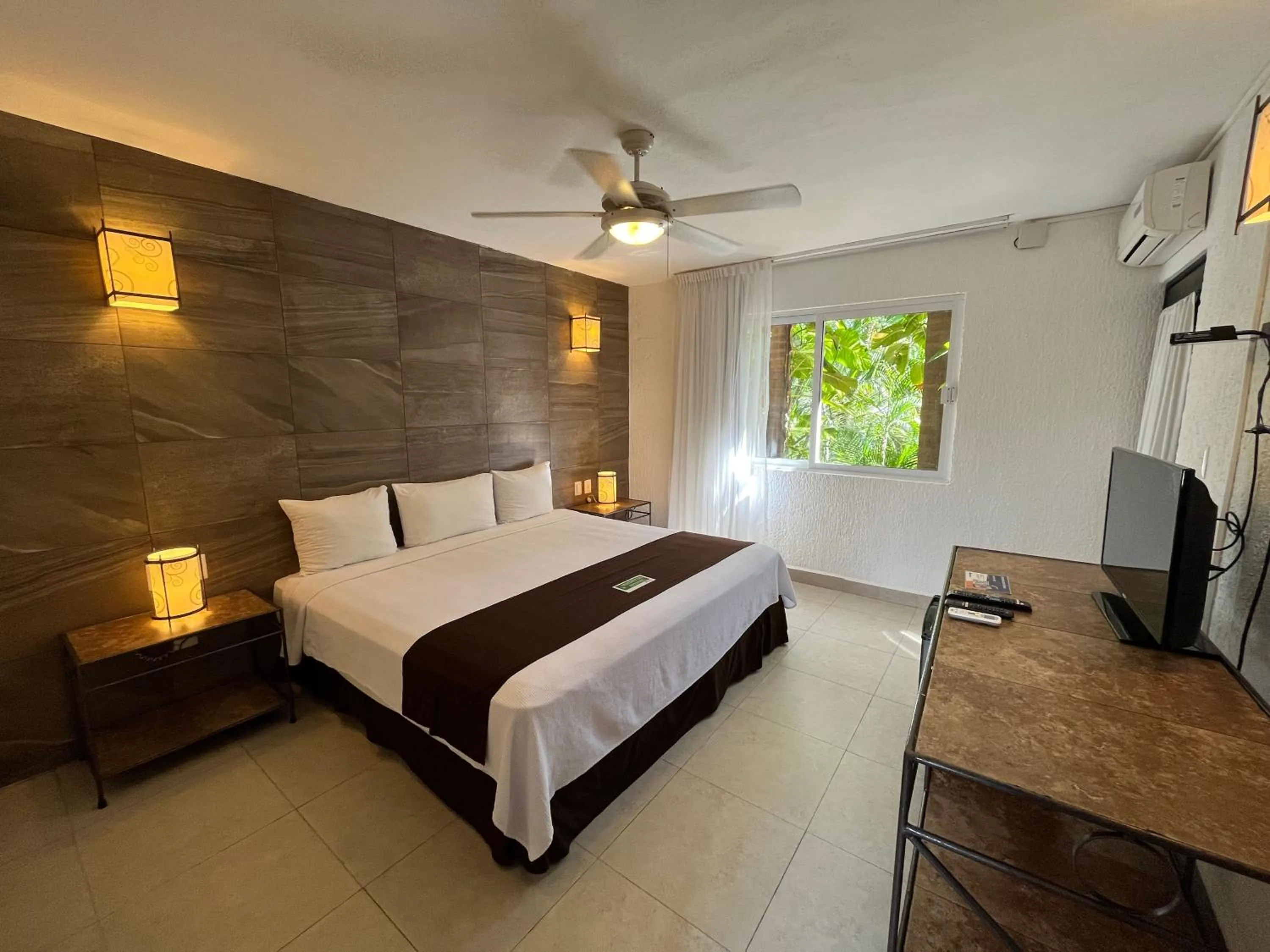 Bed in Tukan Hotel Playa del Carmen
