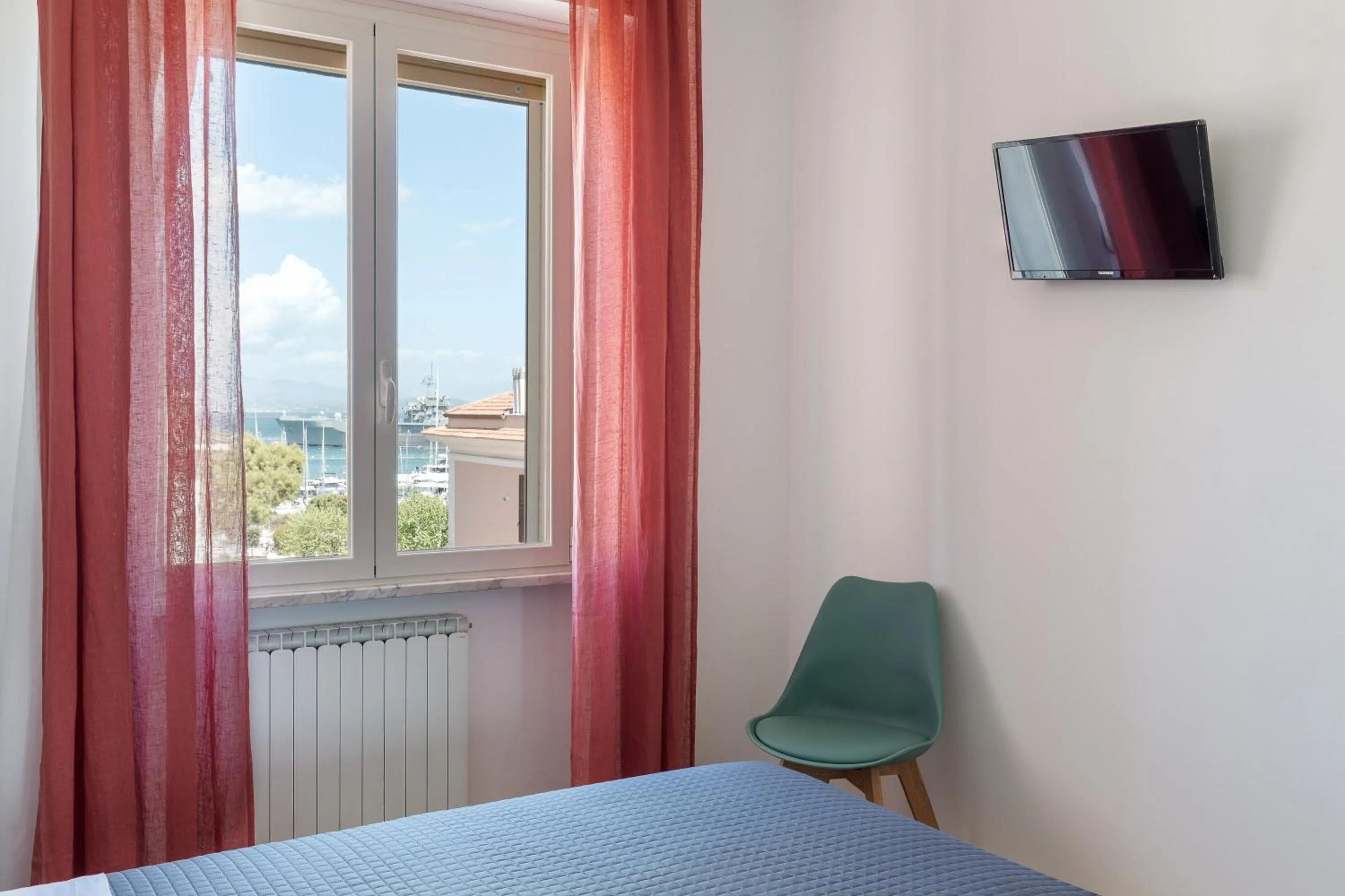 Communal lounge/ TV room, Bed in La Figlia del Capitano