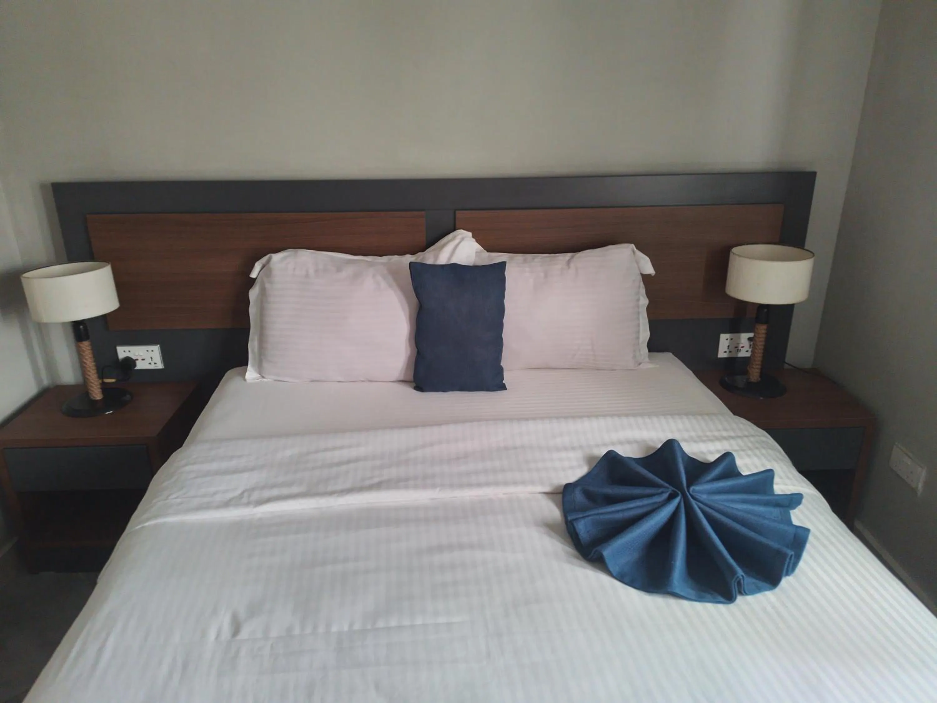 Bed in Euro Homes Hotel