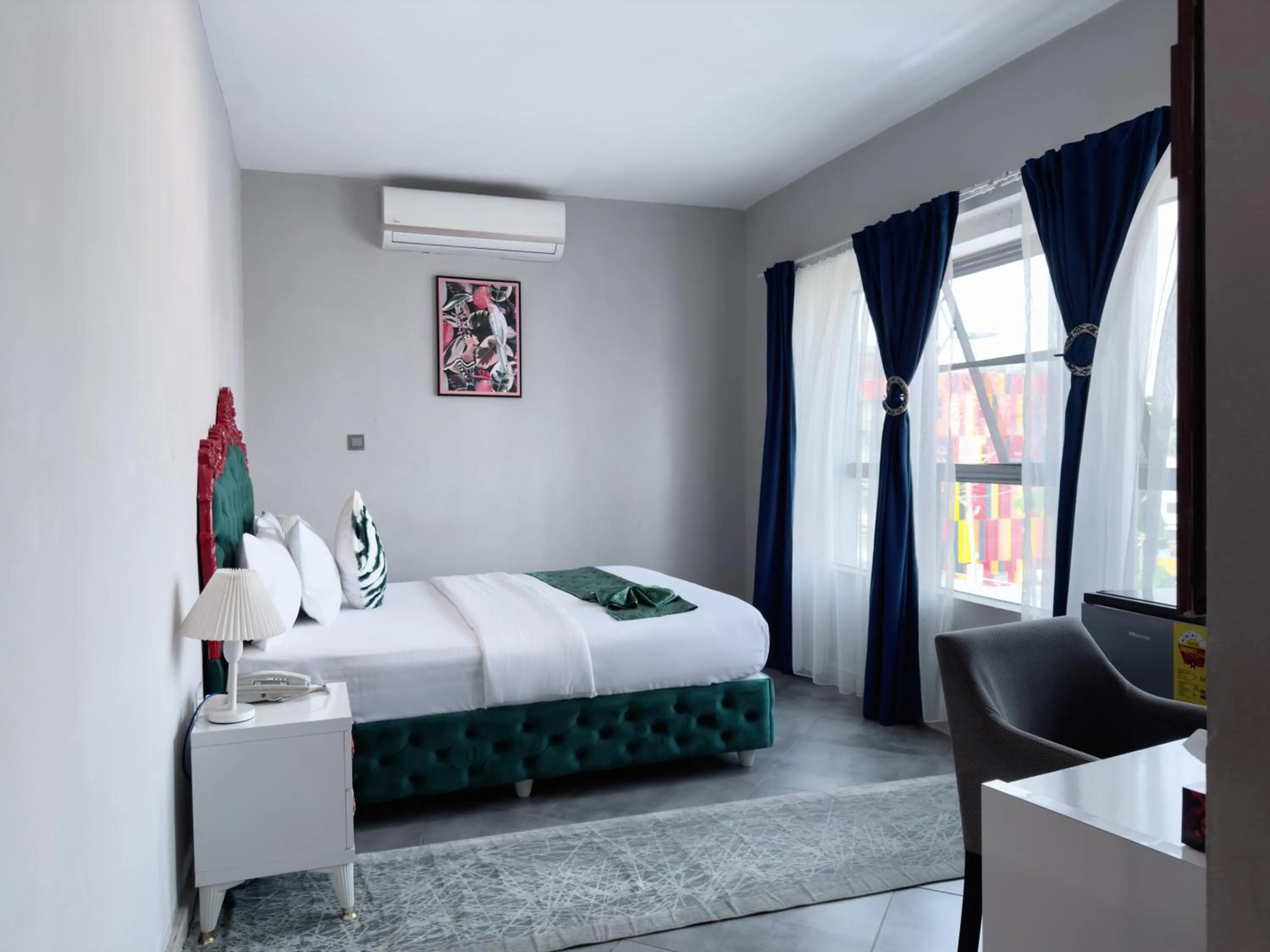 Bed in Euro Homes Hotel