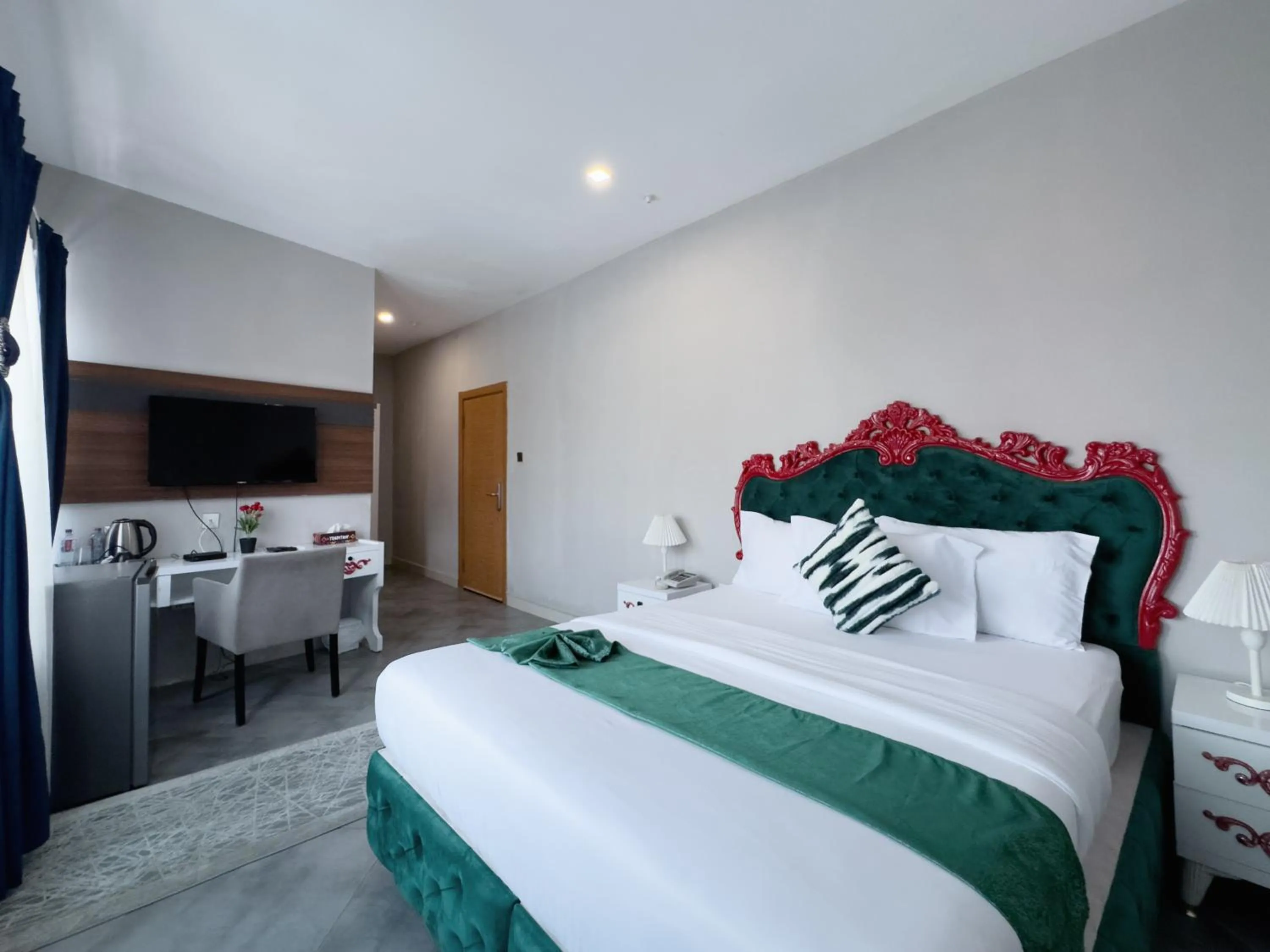 Bed in Euro Homes Hotel