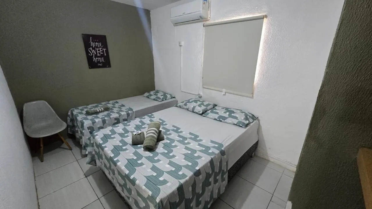 Bed in Casa da Esquina Pousada