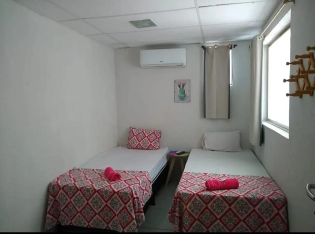 Bed in Casa da Esquina Pousada