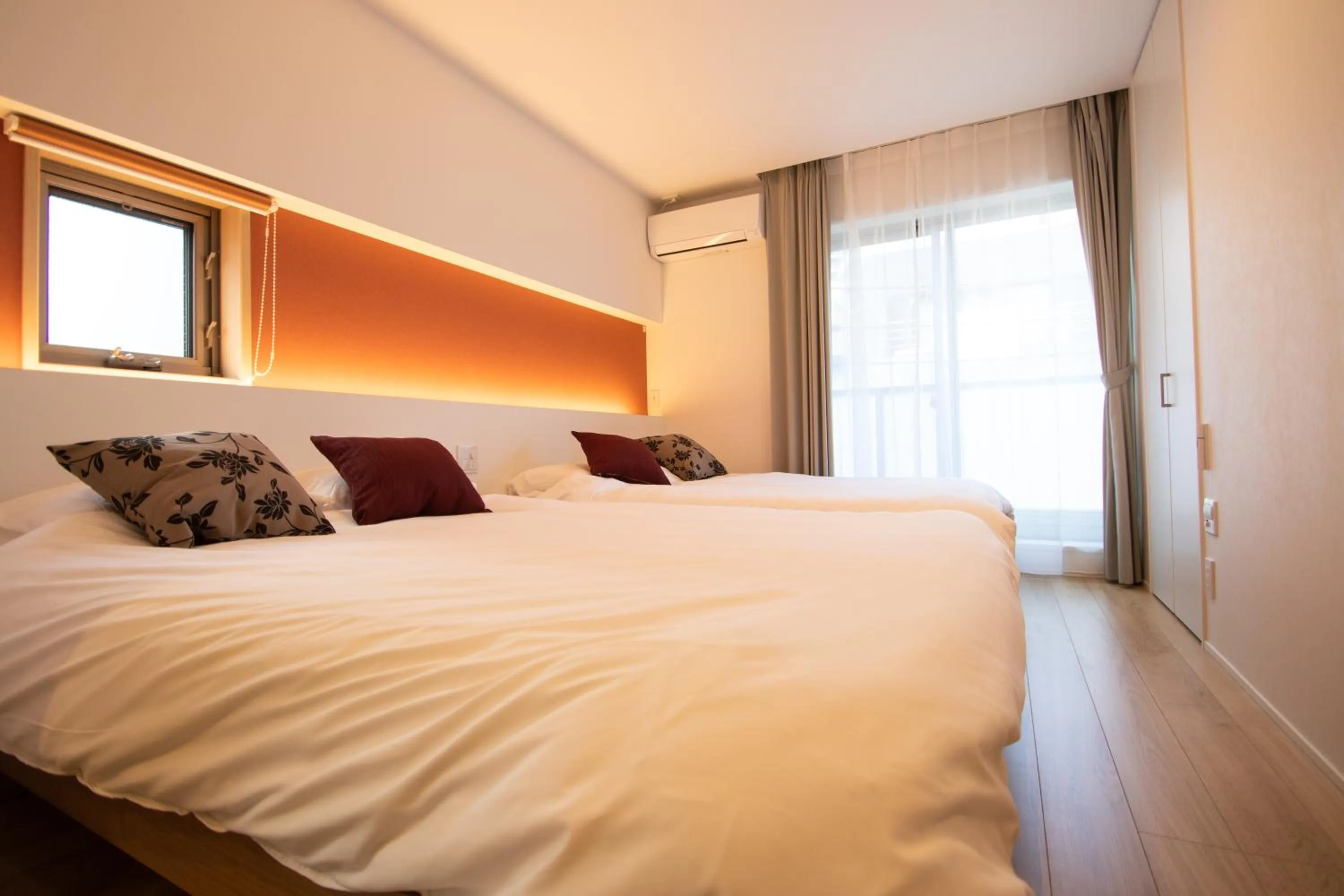 Bed in Apartment Hotel Tenjin TUMUGU