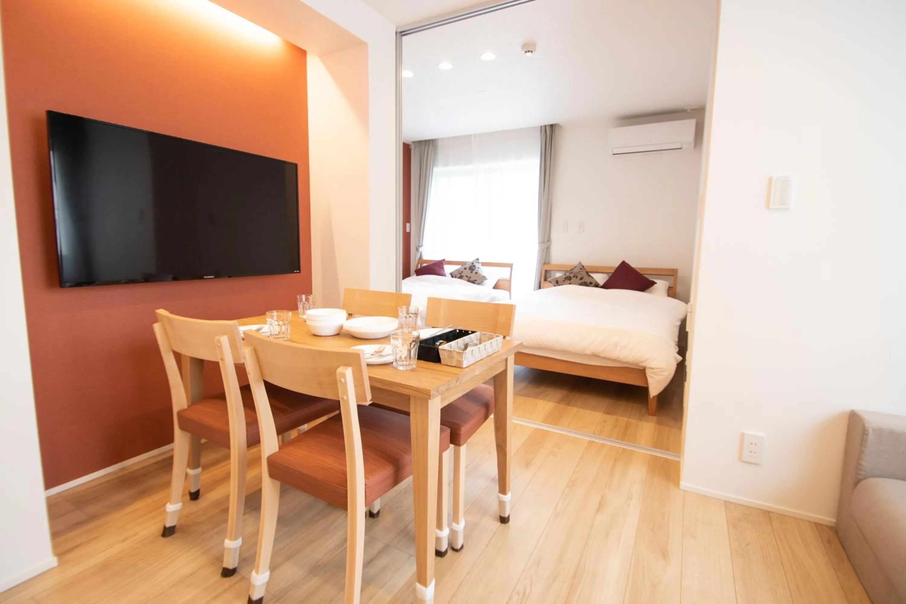 Bed in Apartment Hotel Tenjin TUMUGU