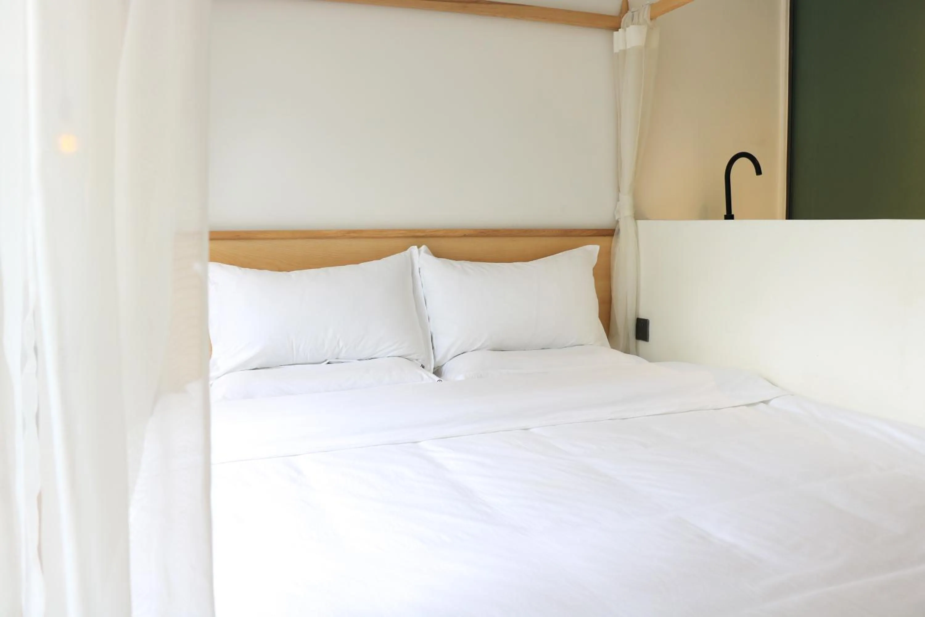 Bed in Moonlight Hotel