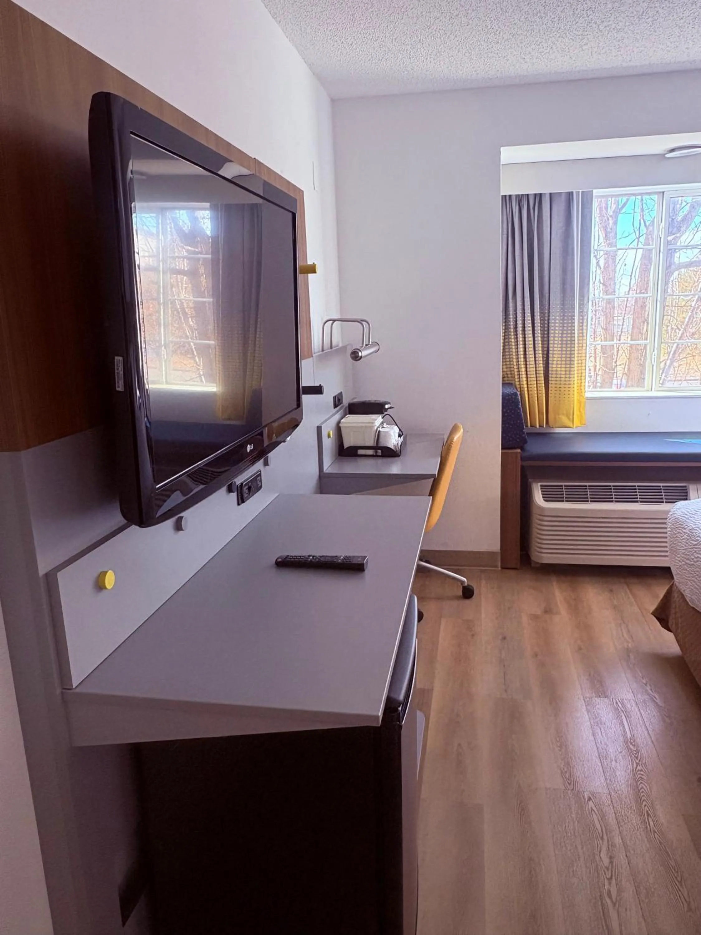 Bed in Microtel Inn & Suites by Wyndham Denver Airport