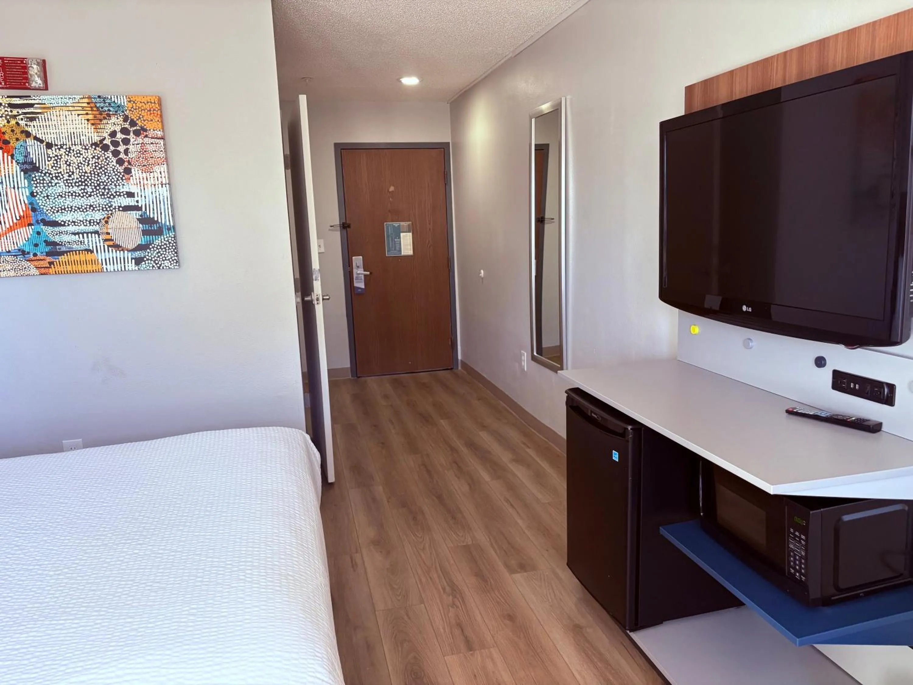 Bed in Microtel Inn & Suites by Wyndham Denver Airport
