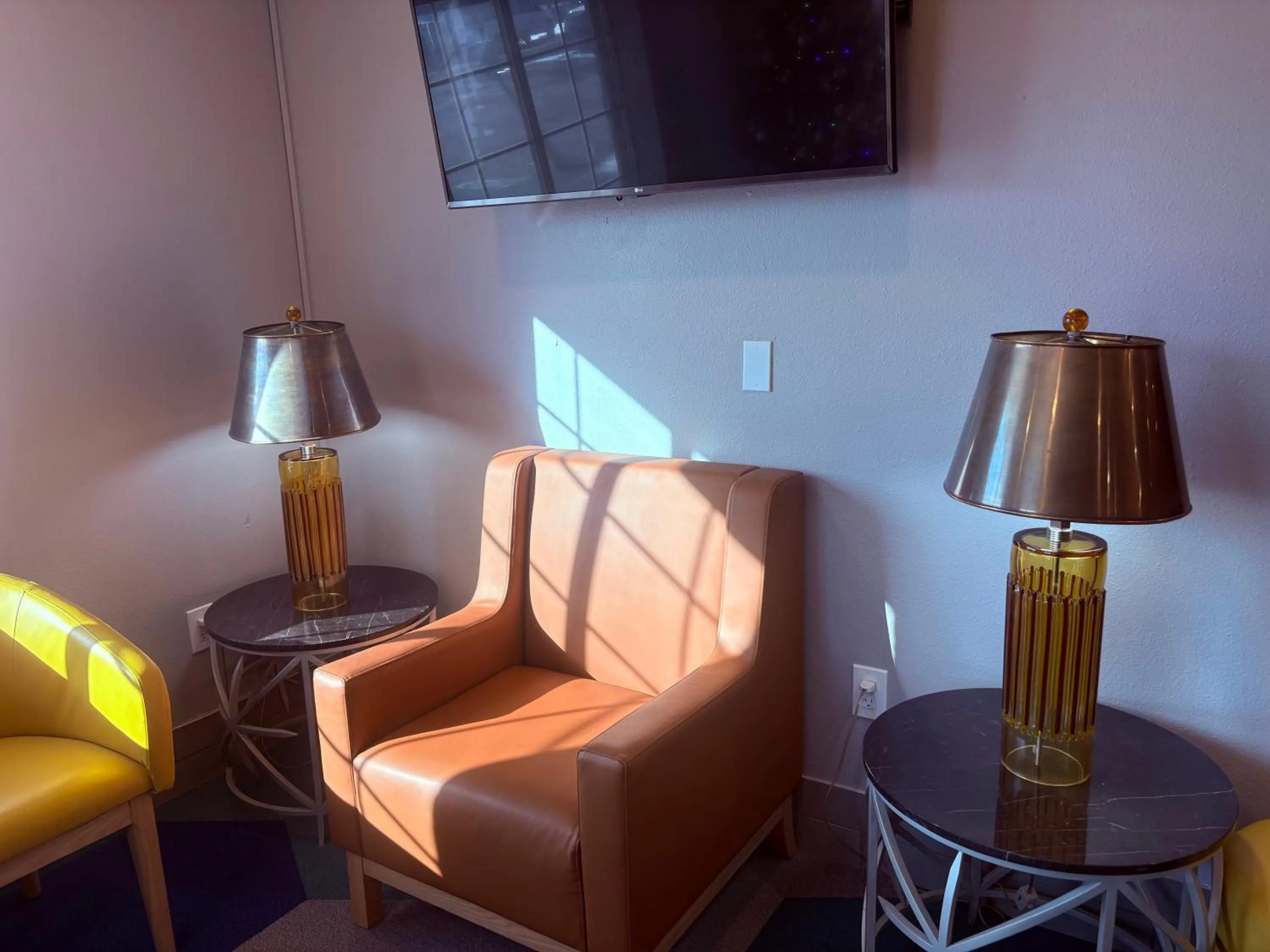 Seating area in Microtel Inn & Suites by Wyndham Denver Airport