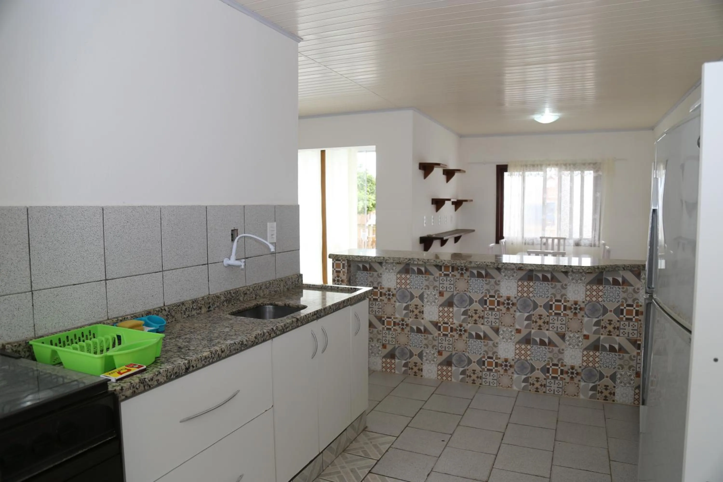 Kitchen or kitchenette in Pousada Oceânica
