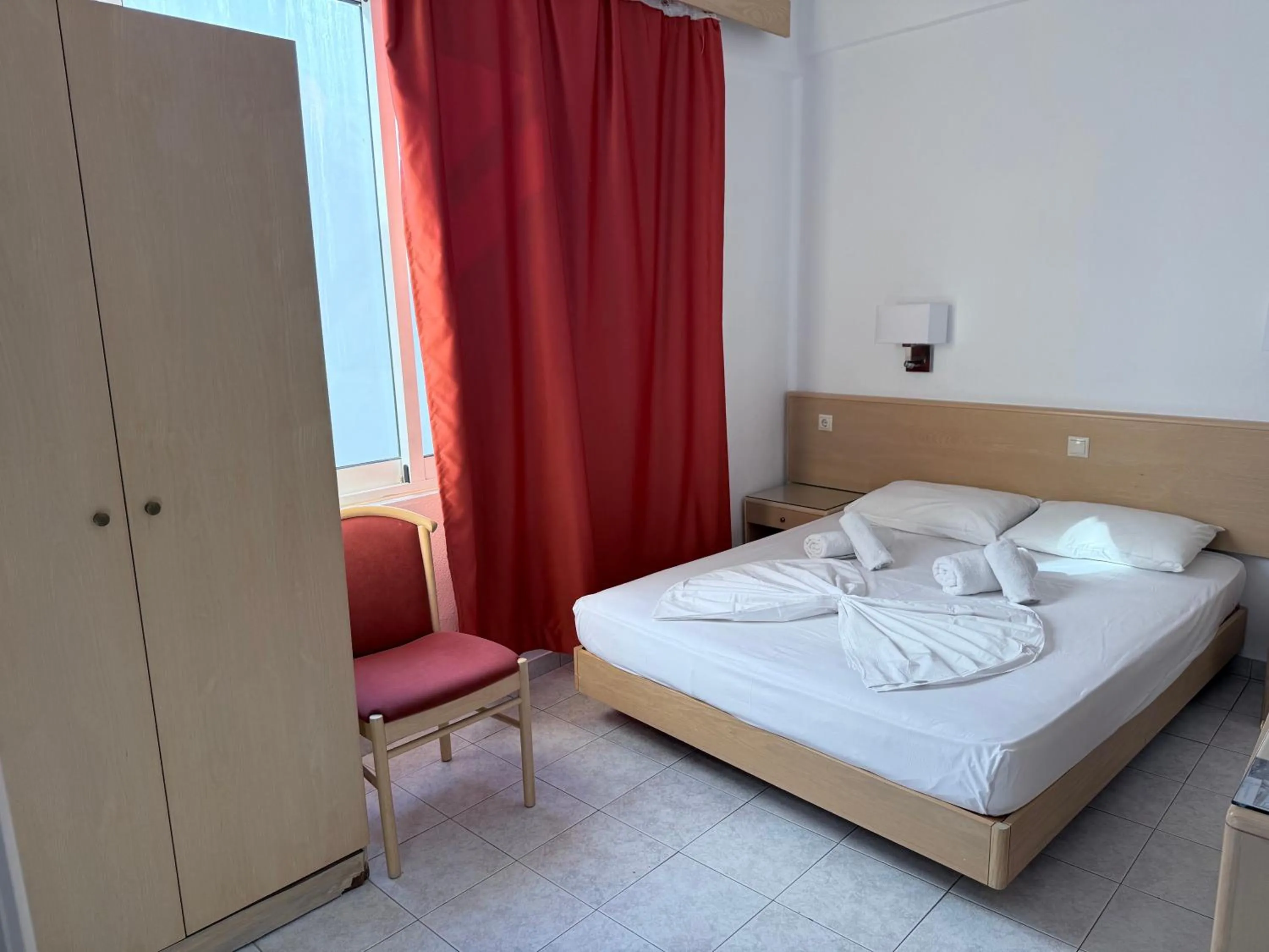 Bed in Savoy City Hotel