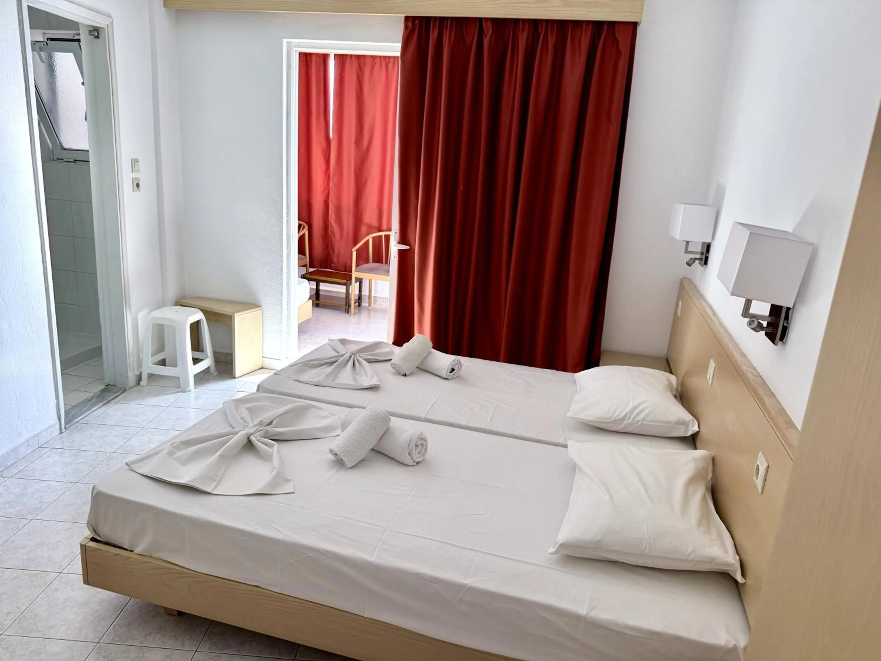 Bed in Savoy City Hotel