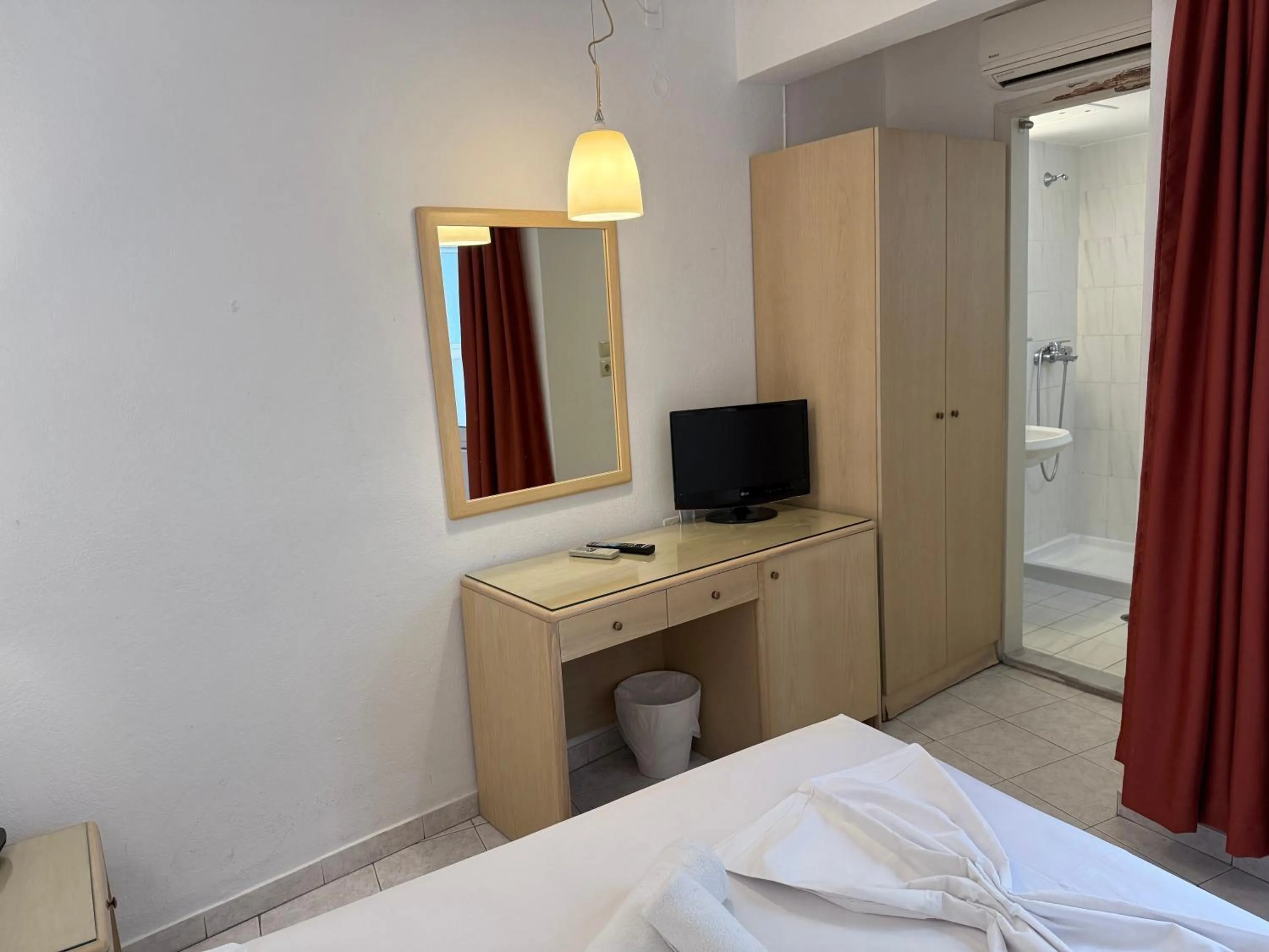 Bed in Savoy City Hotel