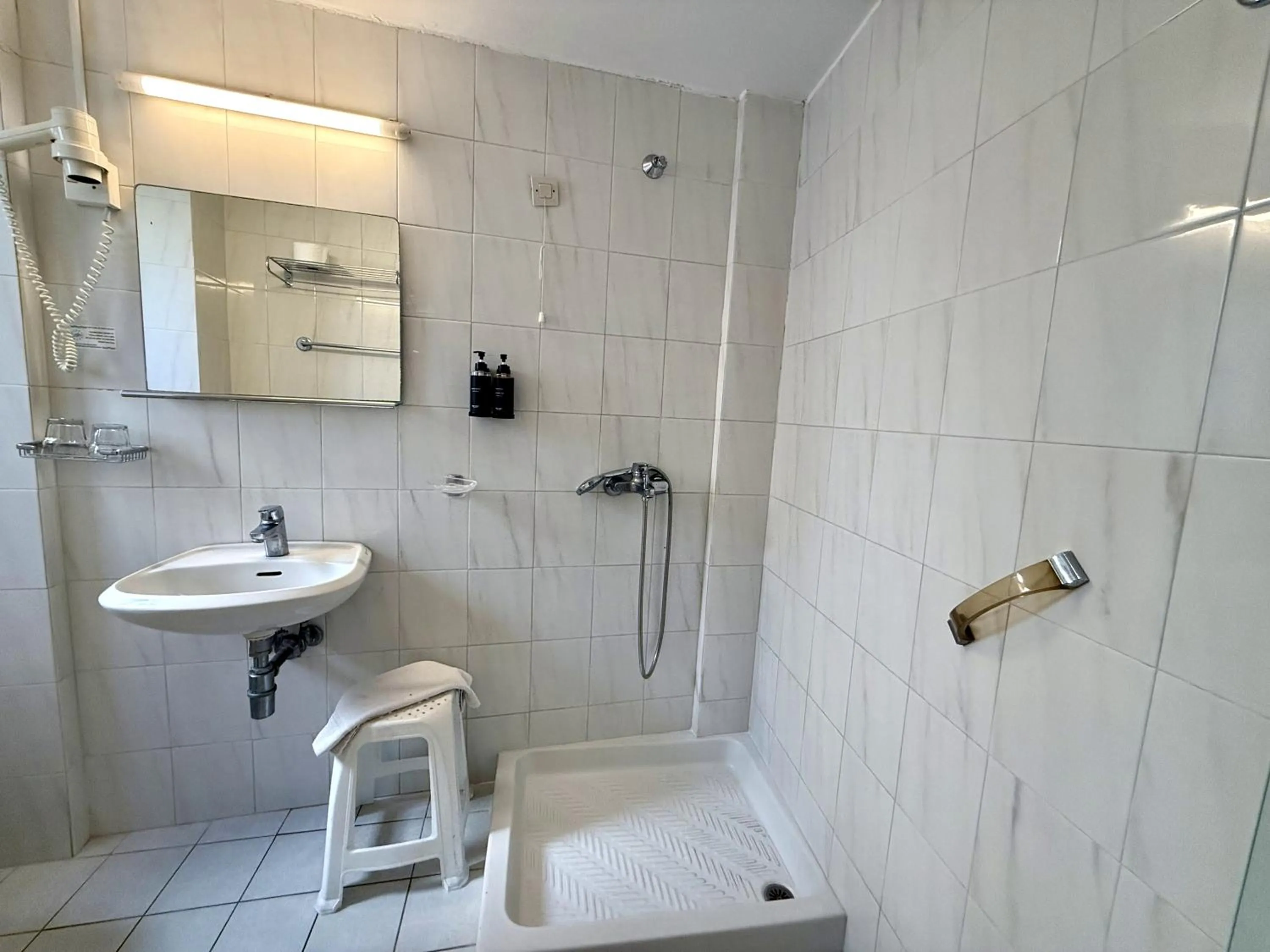 Bathroom in Savoy City Hotel