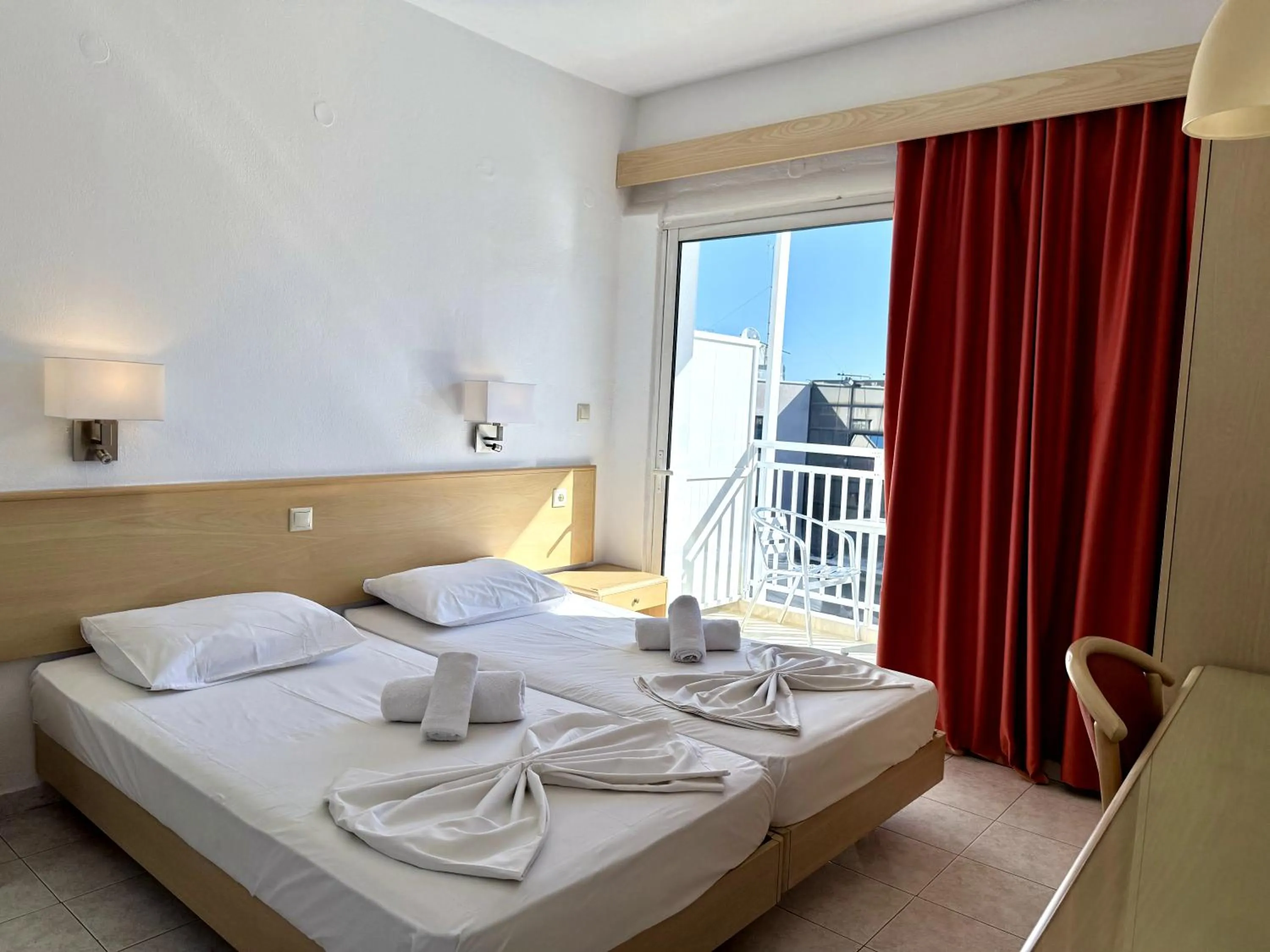 Bed in Savoy City Hotel