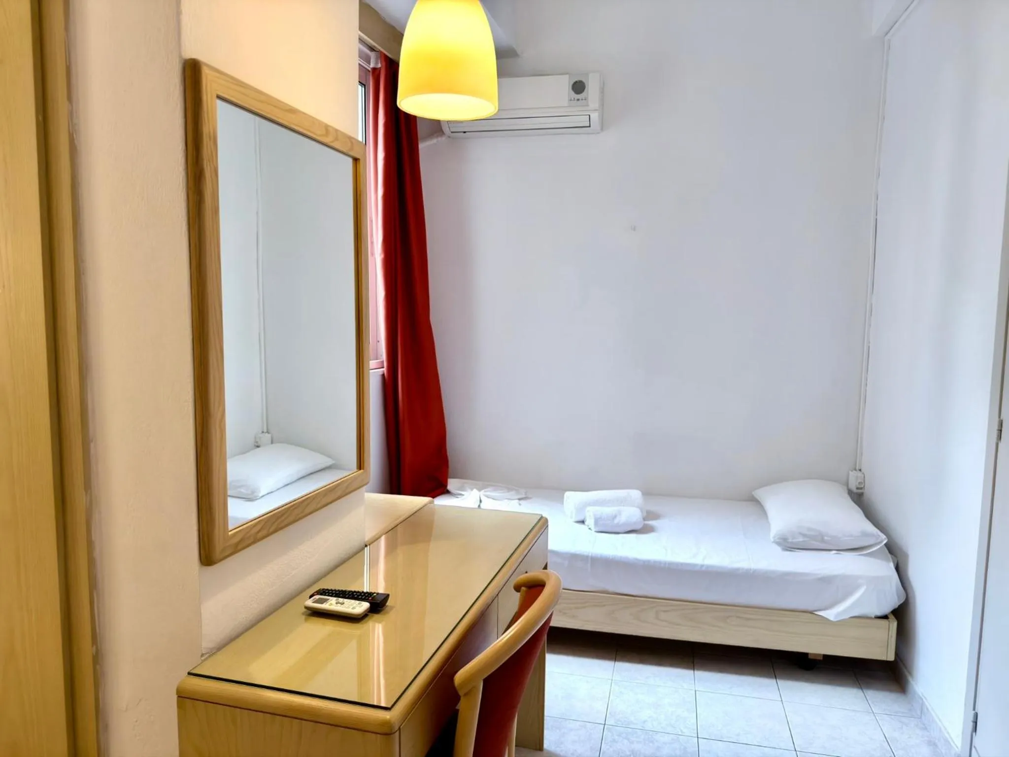 Bed in Savoy City Hotel