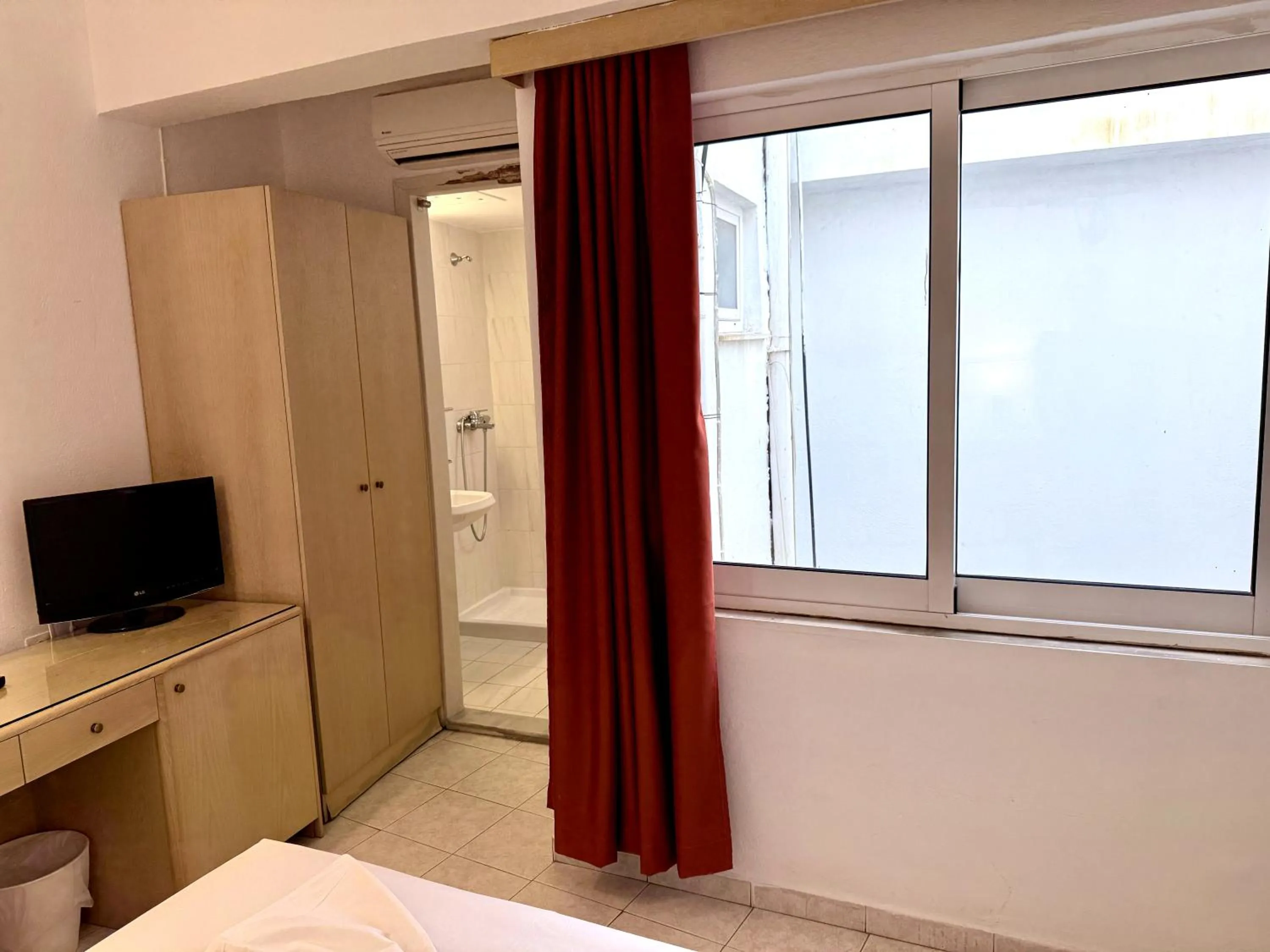 Bed in Savoy City Hotel