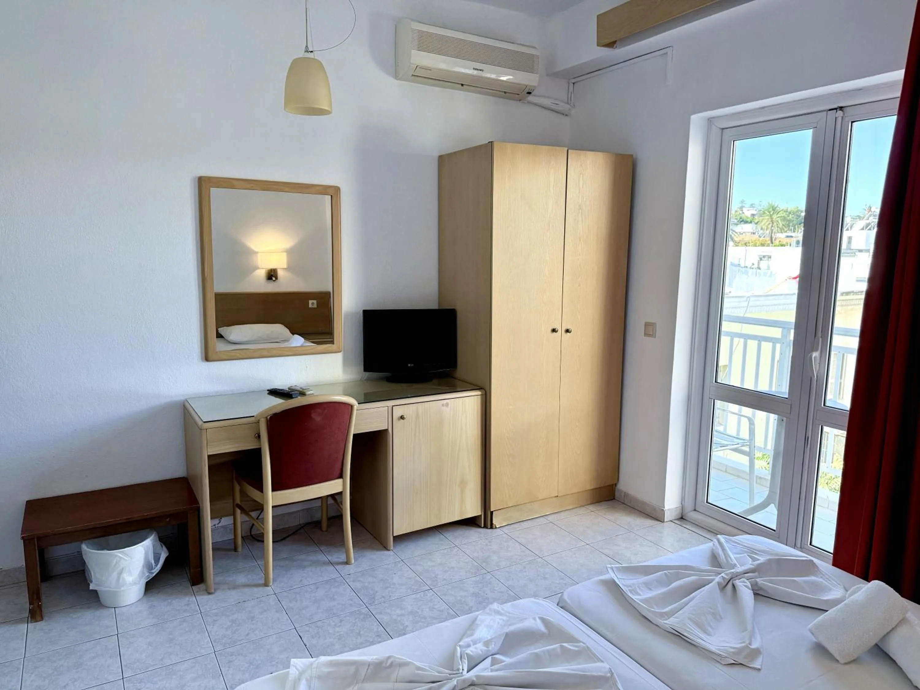 Bed in Savoy City Hotel