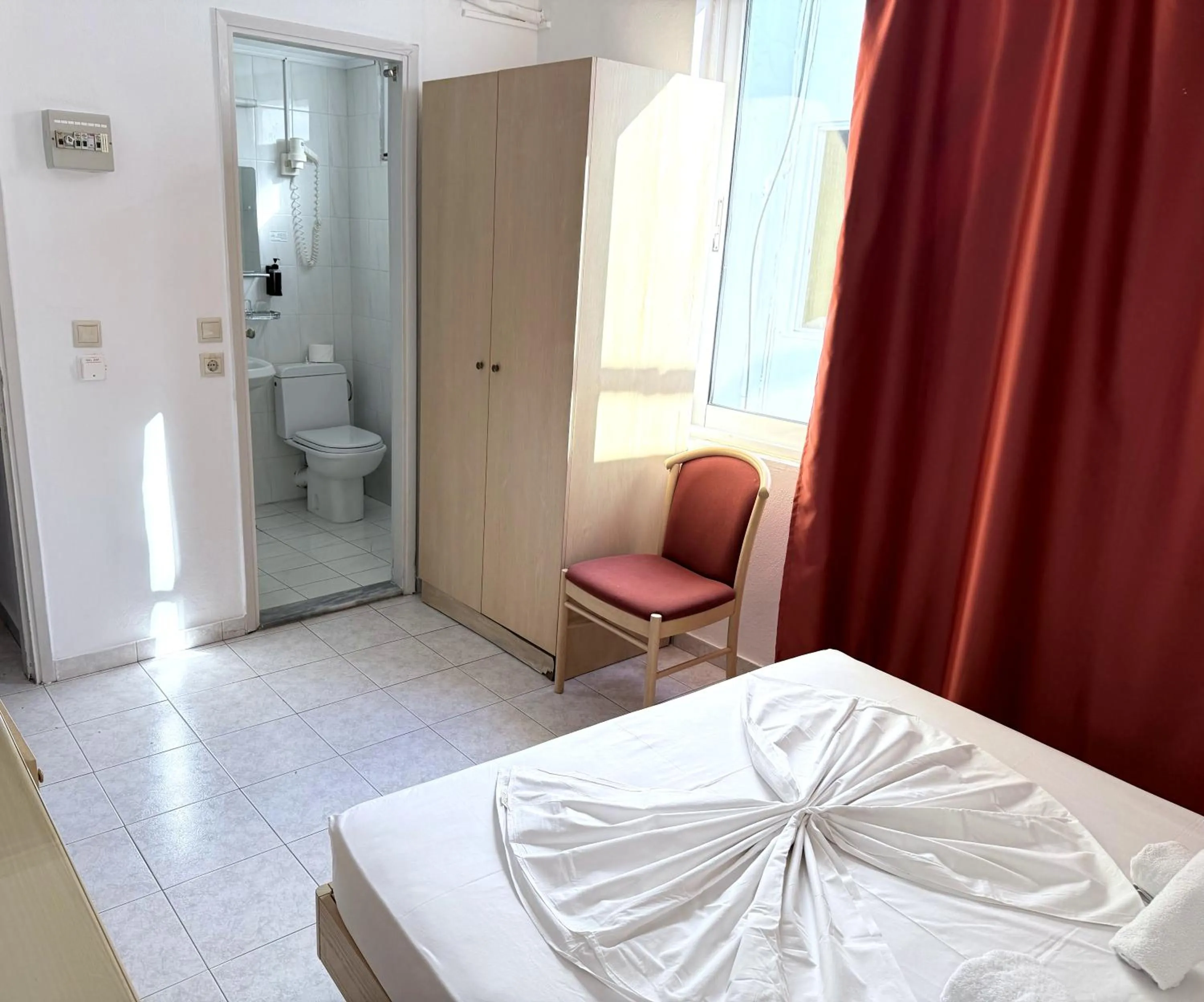 Bed in Savoy City Hotel