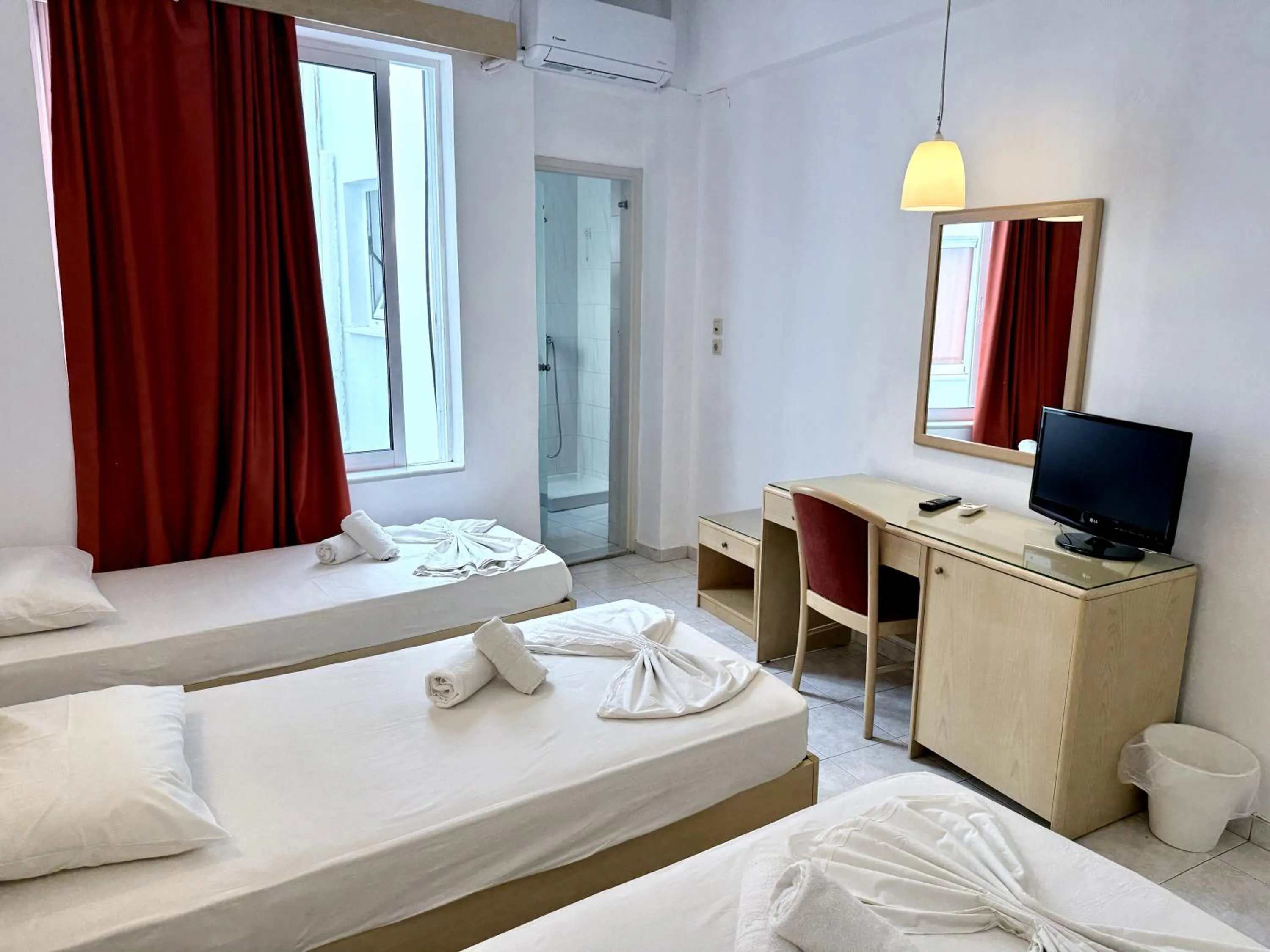 Bed in Savoy City Hotel