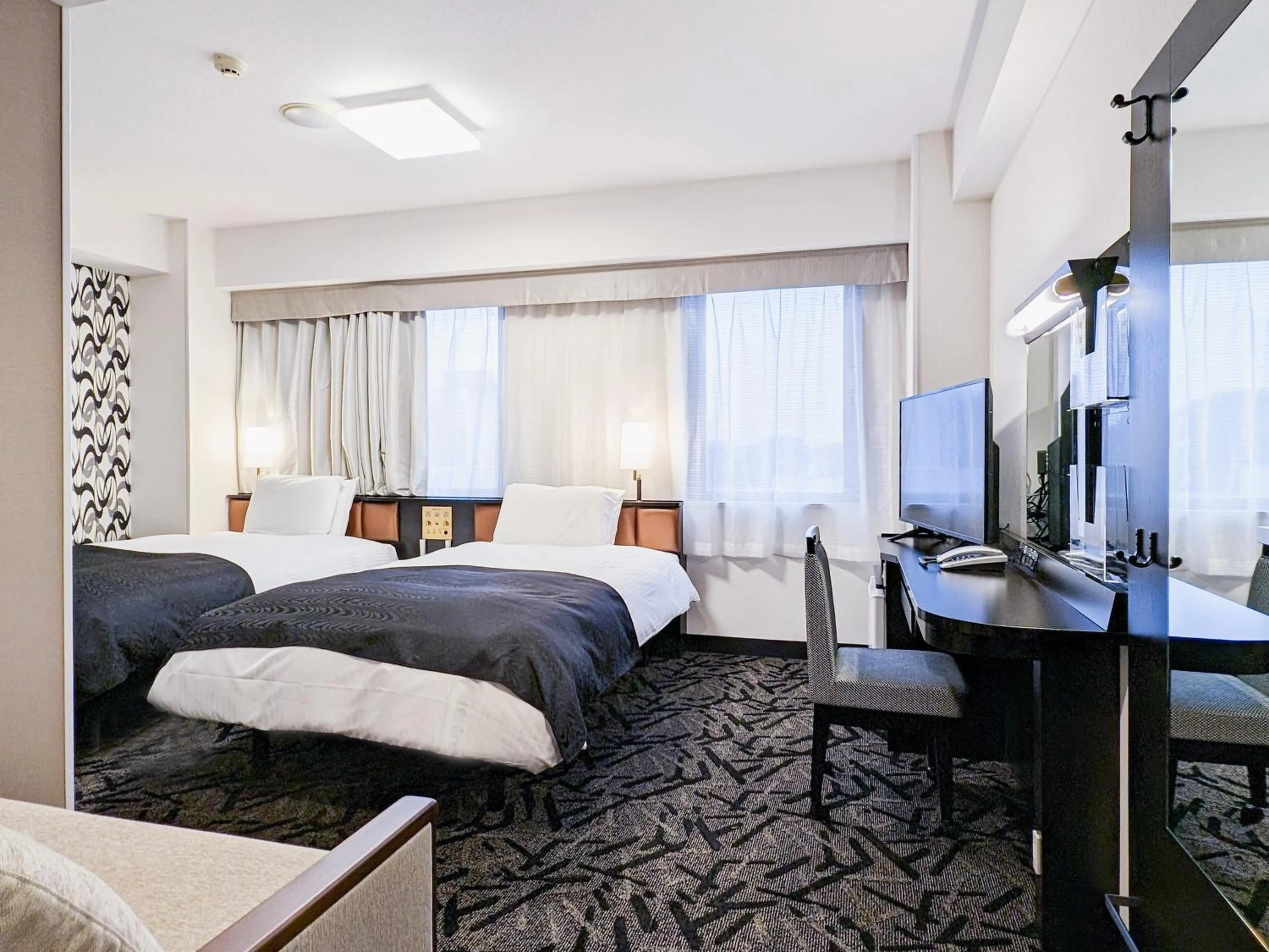 Photo of the whole room, Bed in APA Hotel Akita Senshu Koen