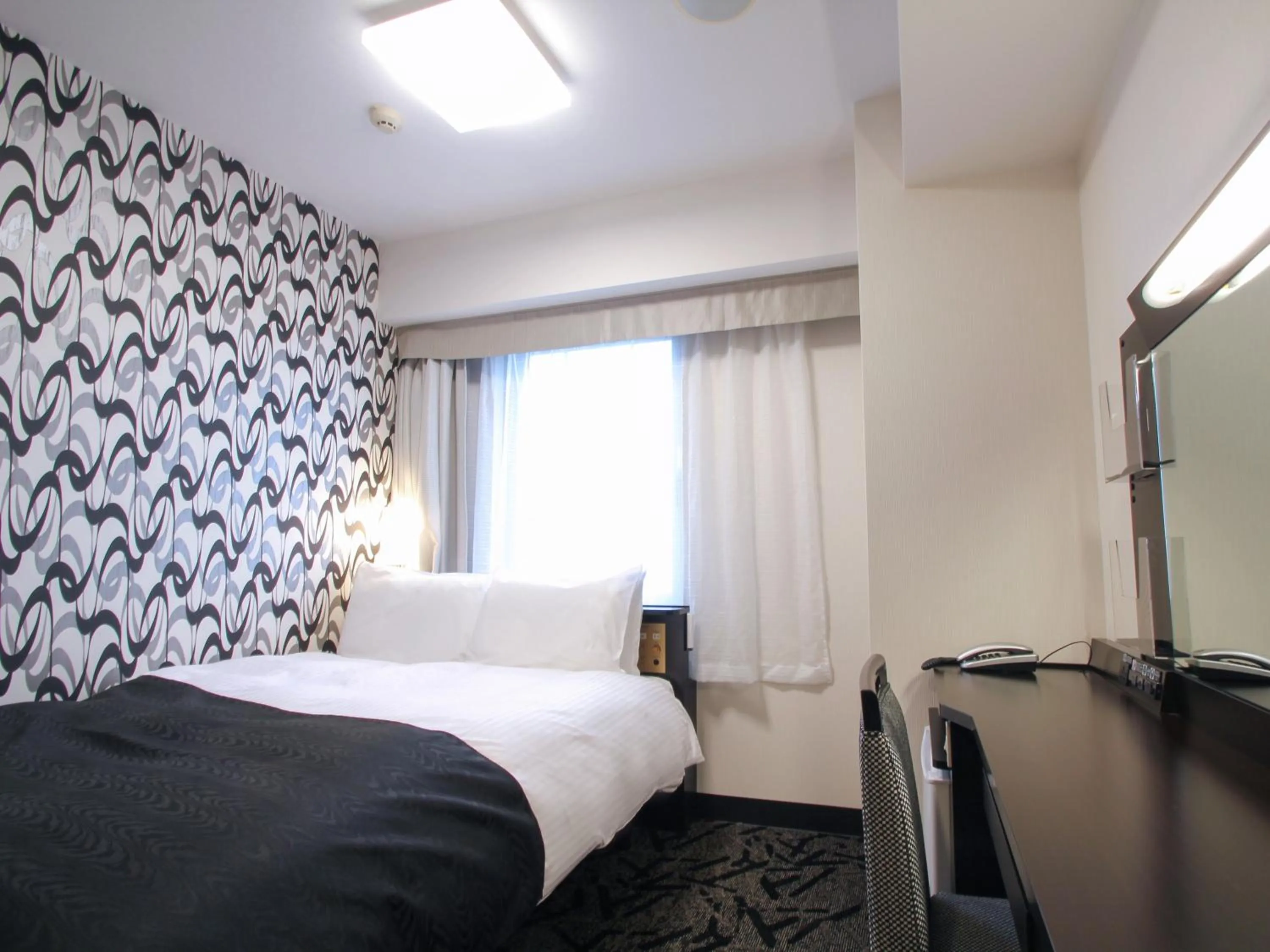 Photo of the whole room, Bed in APA Hotel Akita Senshu Koen