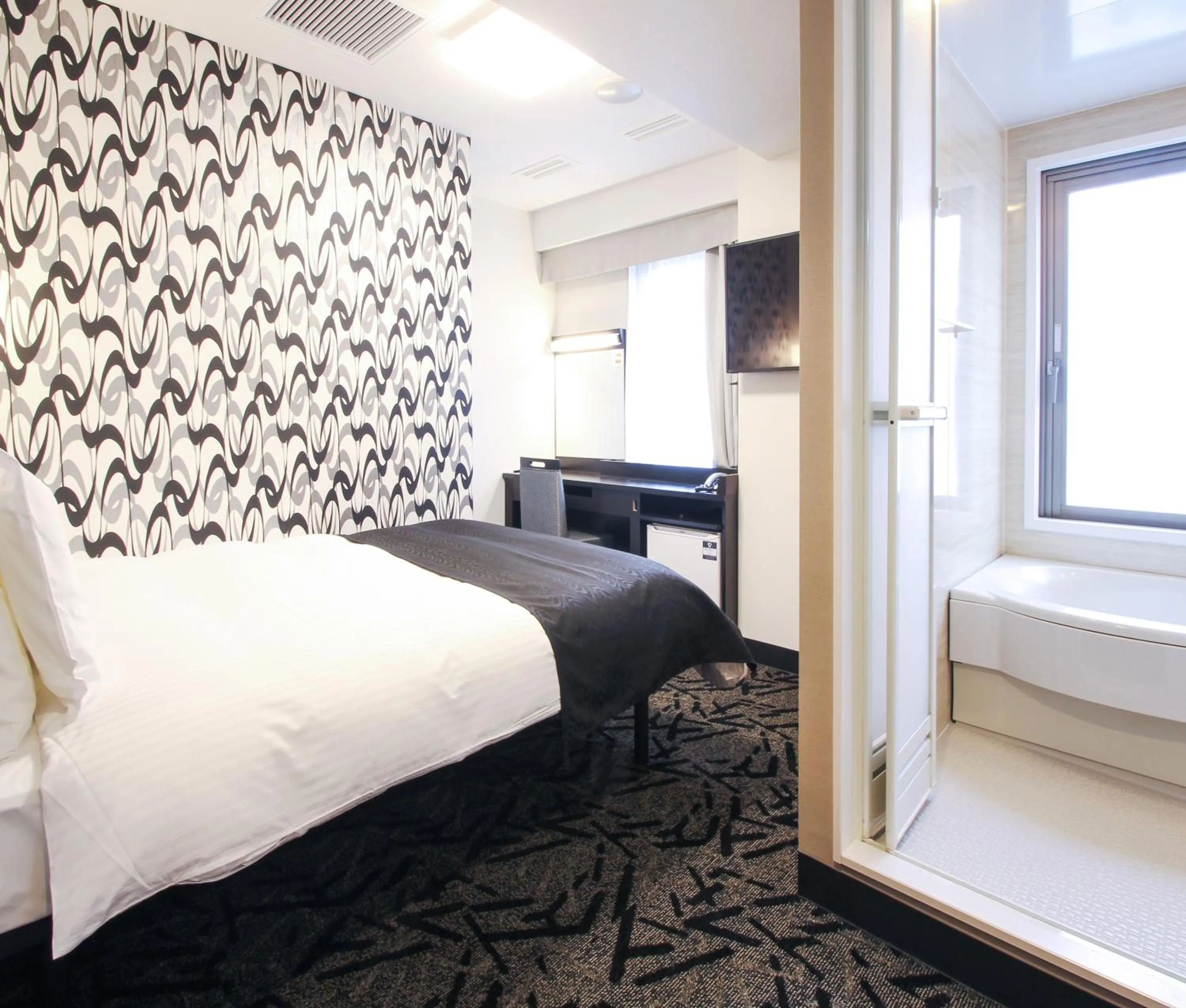 Photo of the whole room, Bed in APA Hotel Akita Senshu Koen