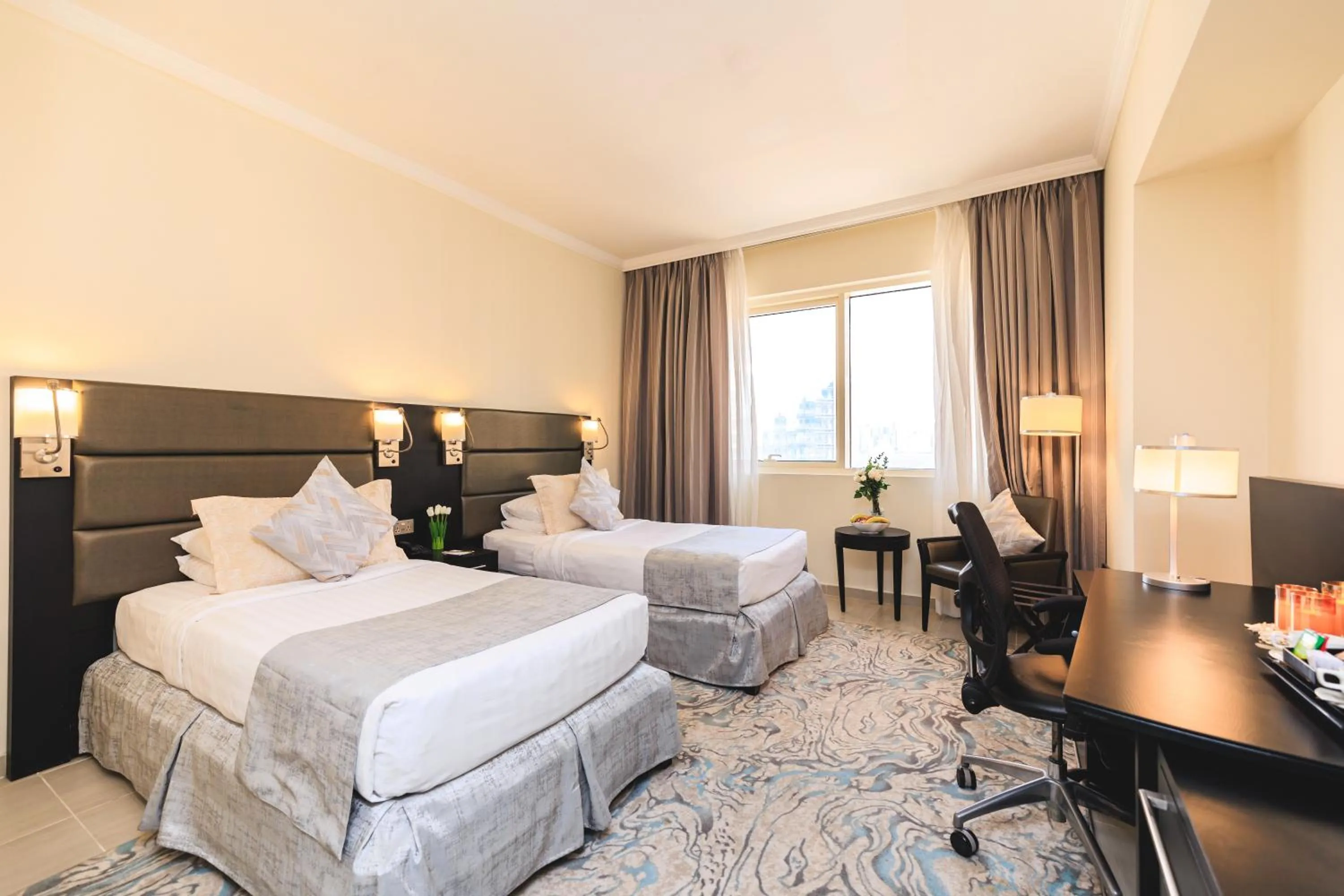 Bed in The Royal Riviera Hotel Doha