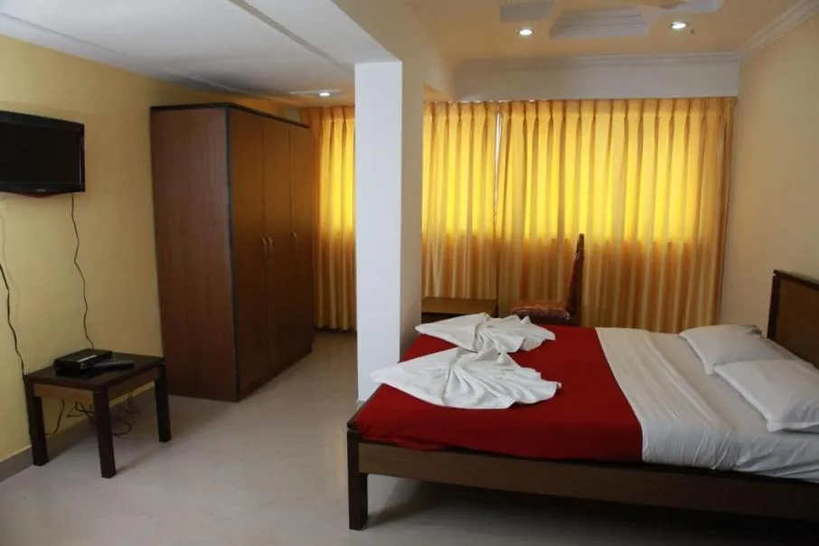 Photo of the whole room, Bed in Saiesh International Hotel