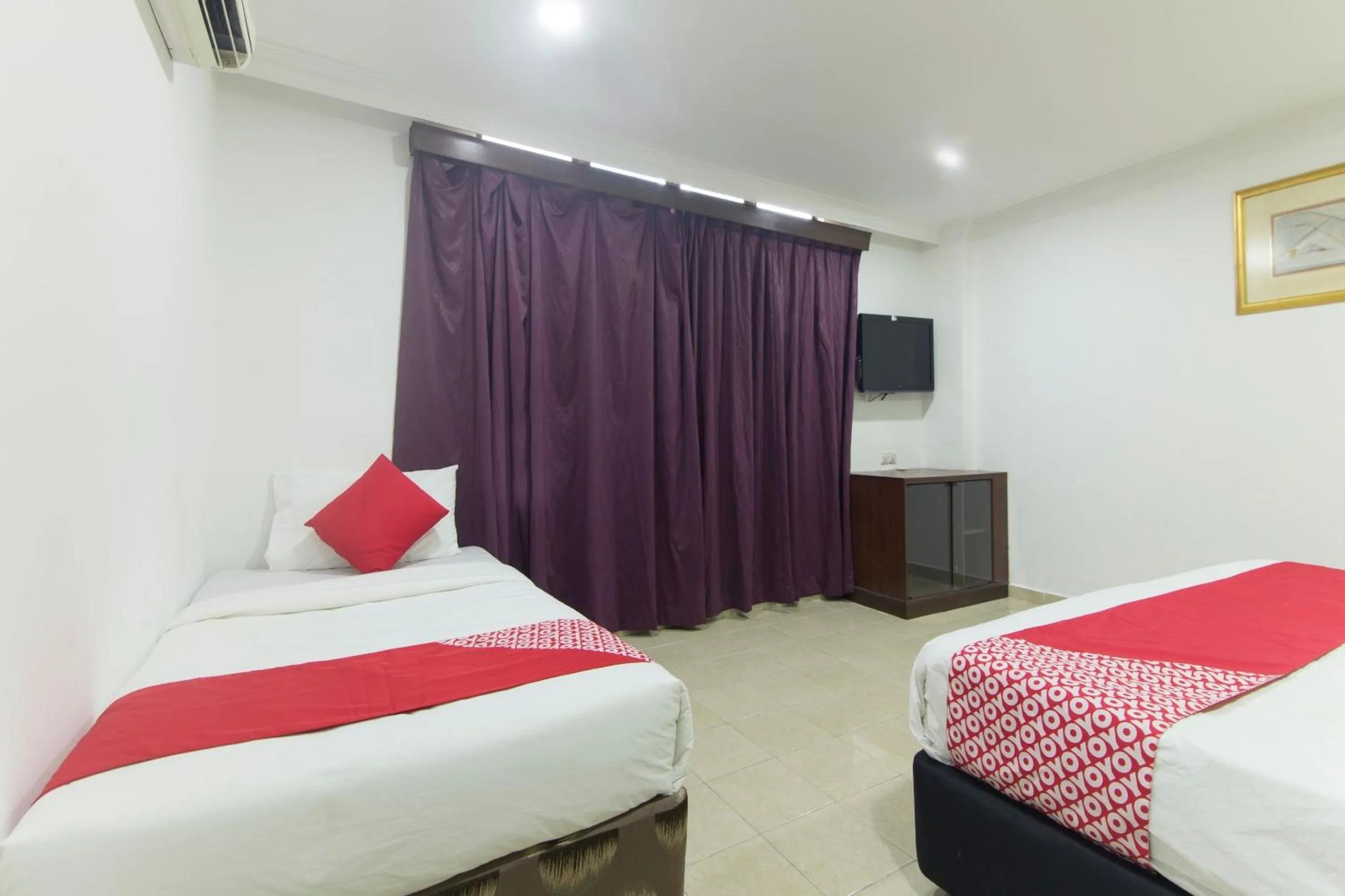 Bedroom, TV/Entertainment Center in OYO 805 Hotel Run Star